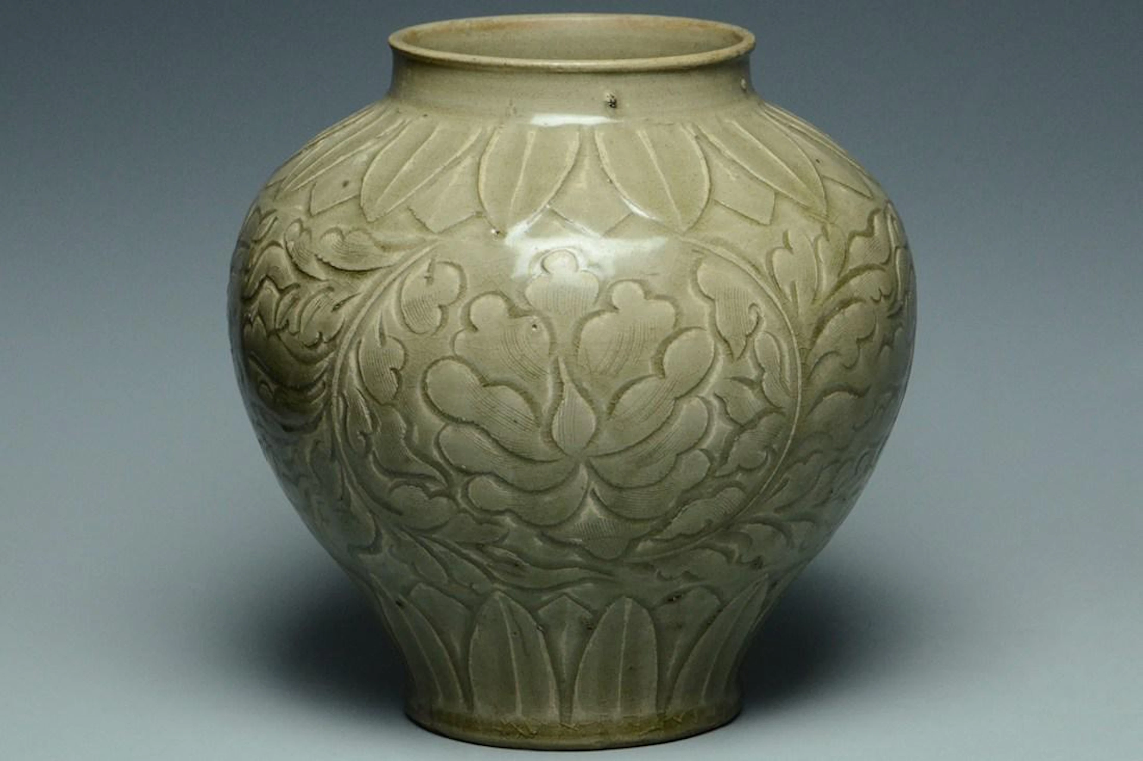 A jin dynasty yaozhou celadon carved jar and box