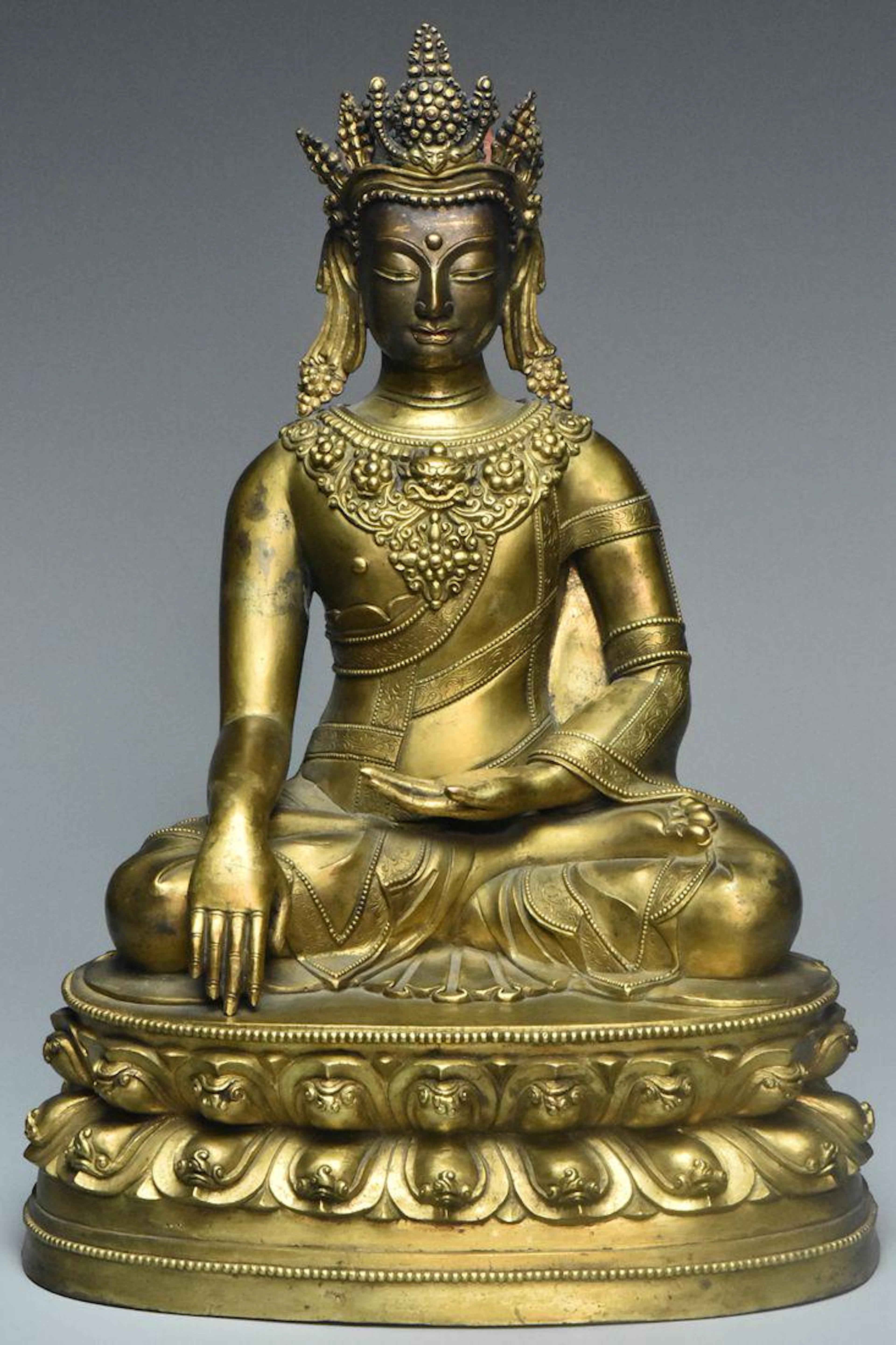 A ming dynasty gilt bronze figure of tara