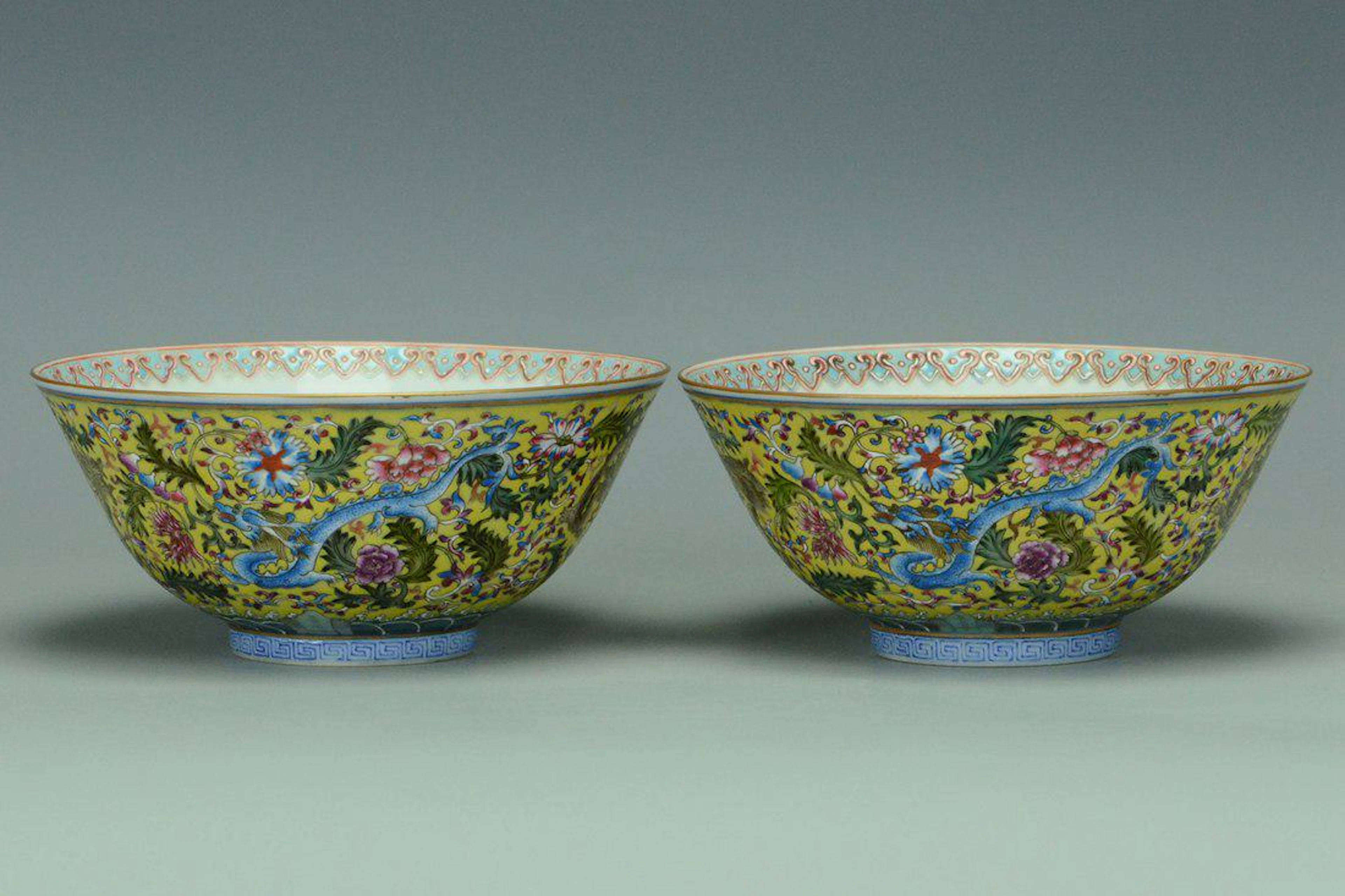 A pair of famille rose dragon bowl qianlong mark
