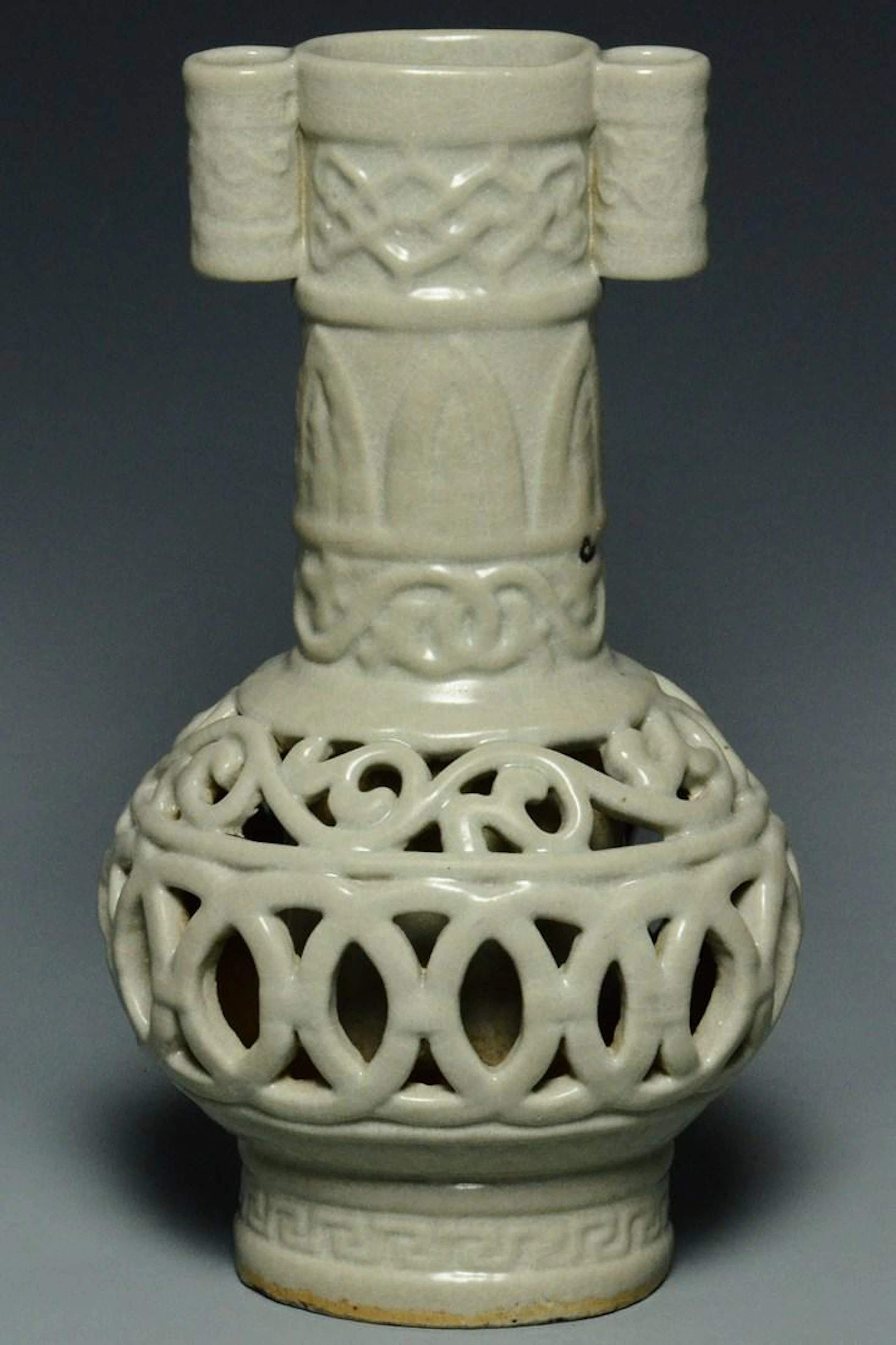 A yuan dynasty longquan celadon openwork vase