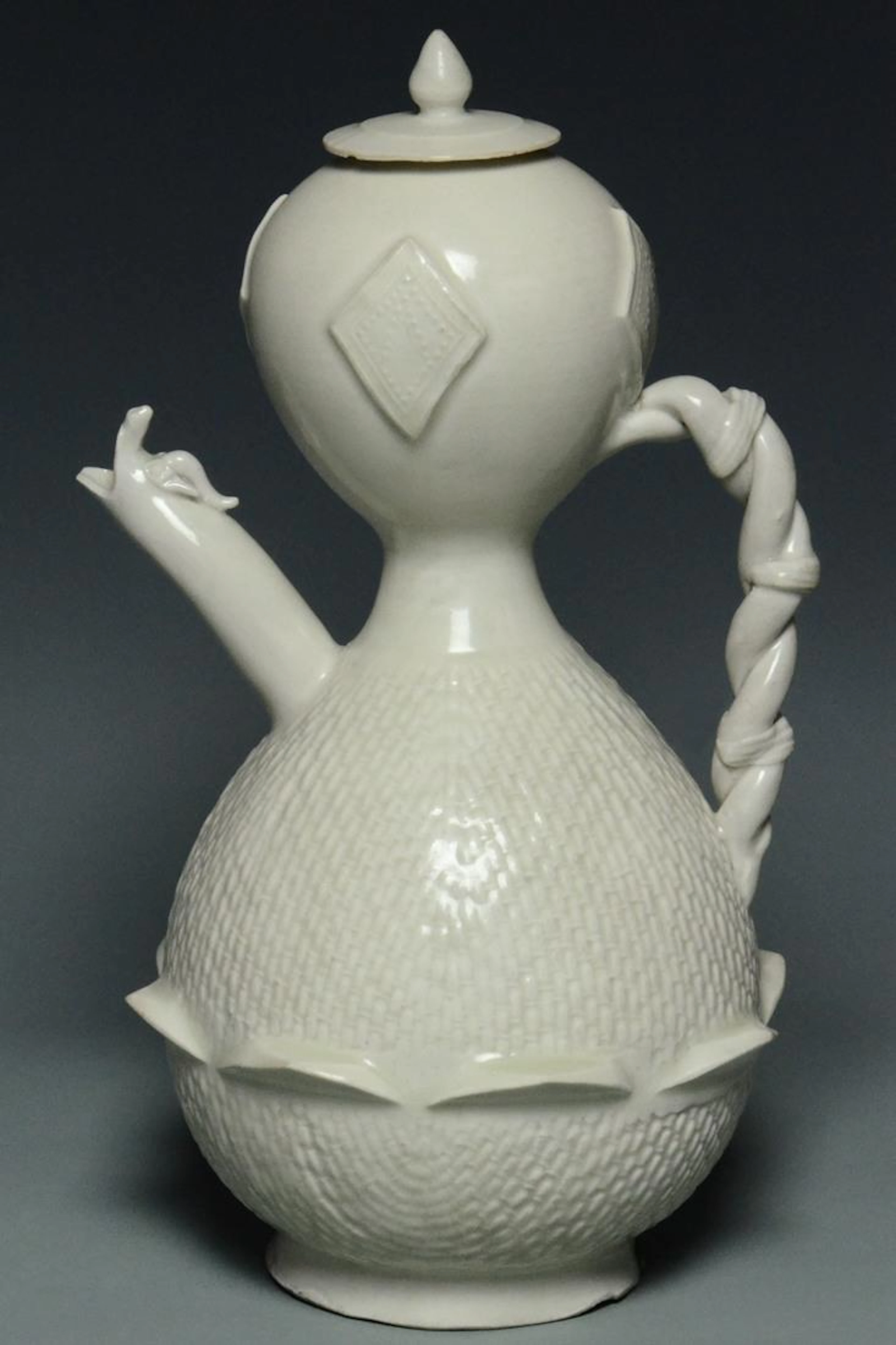 A song dynasty ding ewer and cover