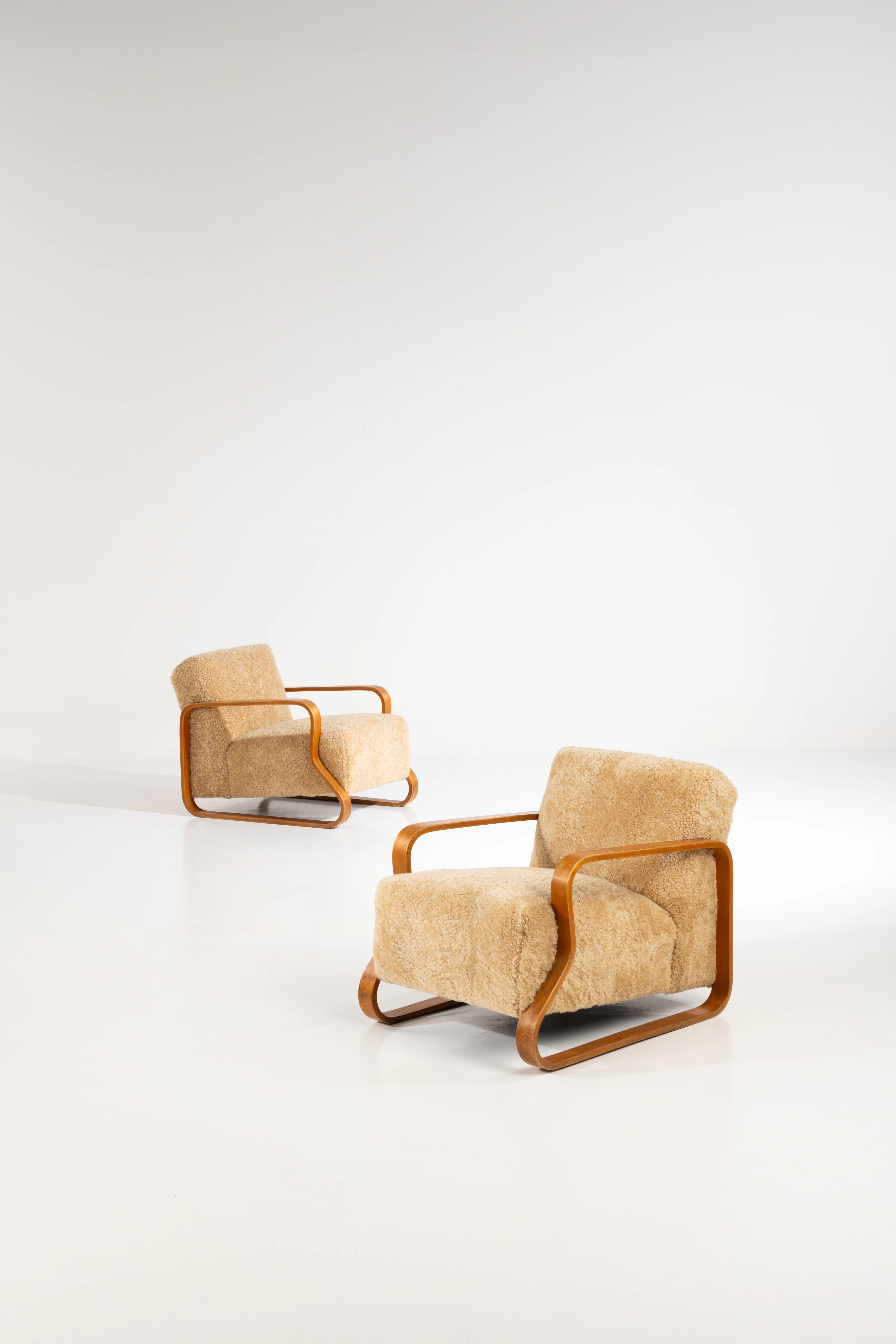 ƒ Alvar Aalto (1898-1976) Pair of armchairs