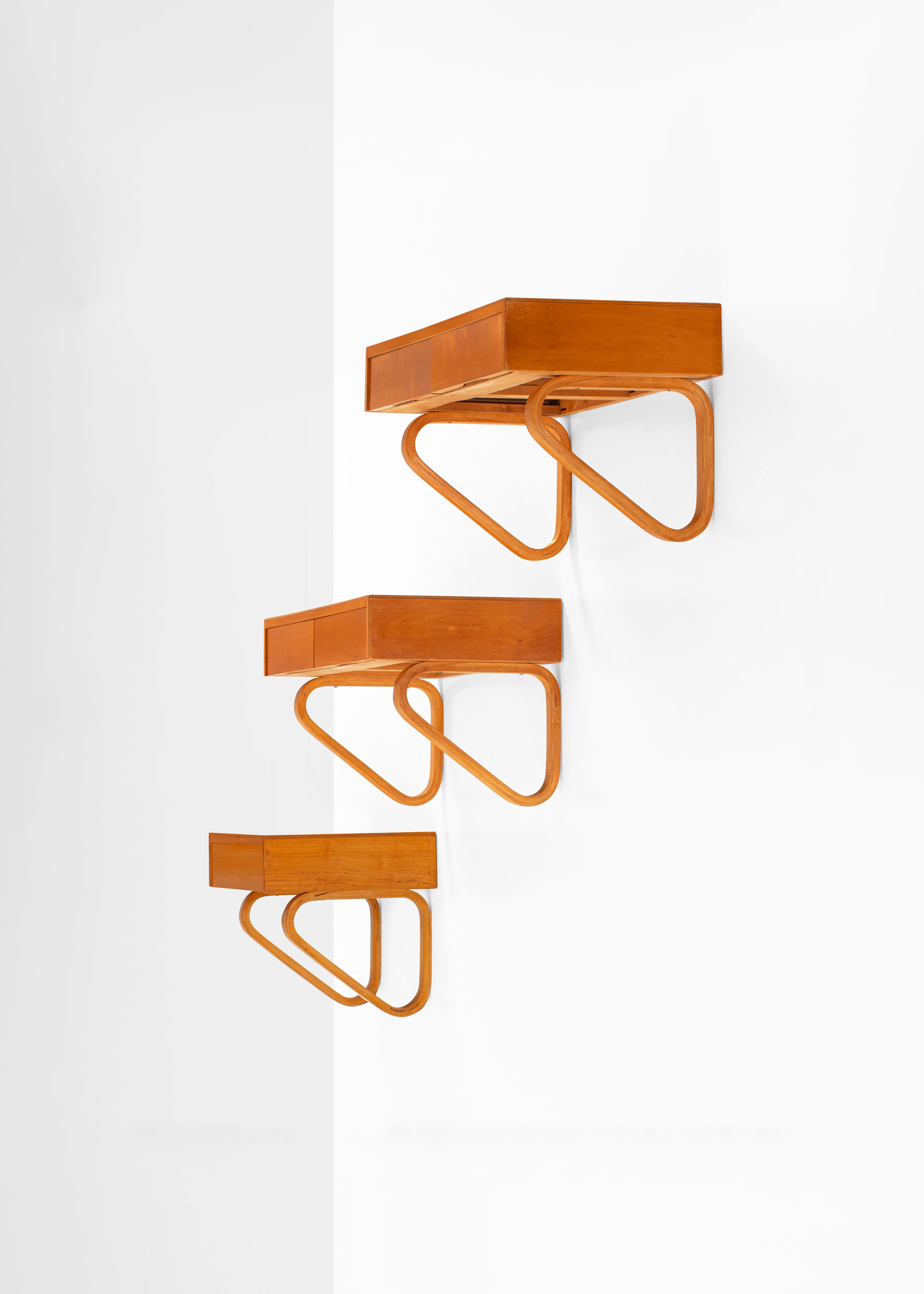 Alvar Aalto (1898-1976) Set of three wall-mounted...