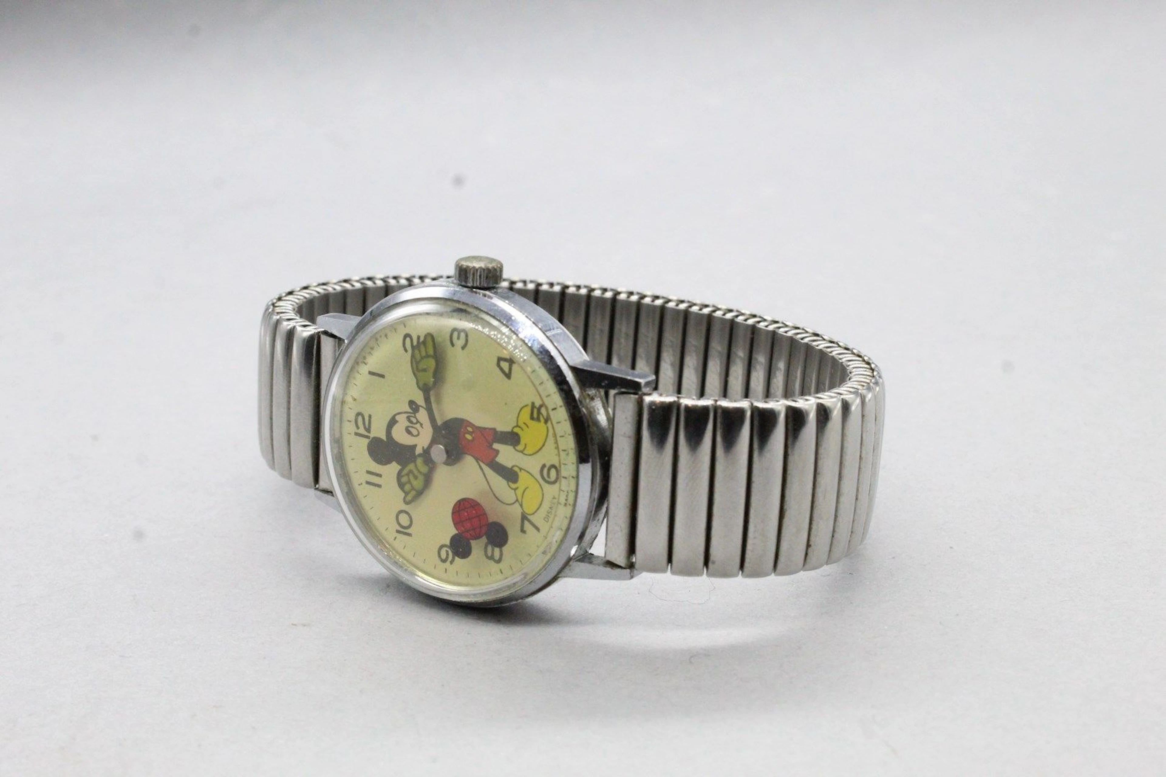 DISNEY Montre bracelet unisexe en métal,... - Lot 615 - Rossini