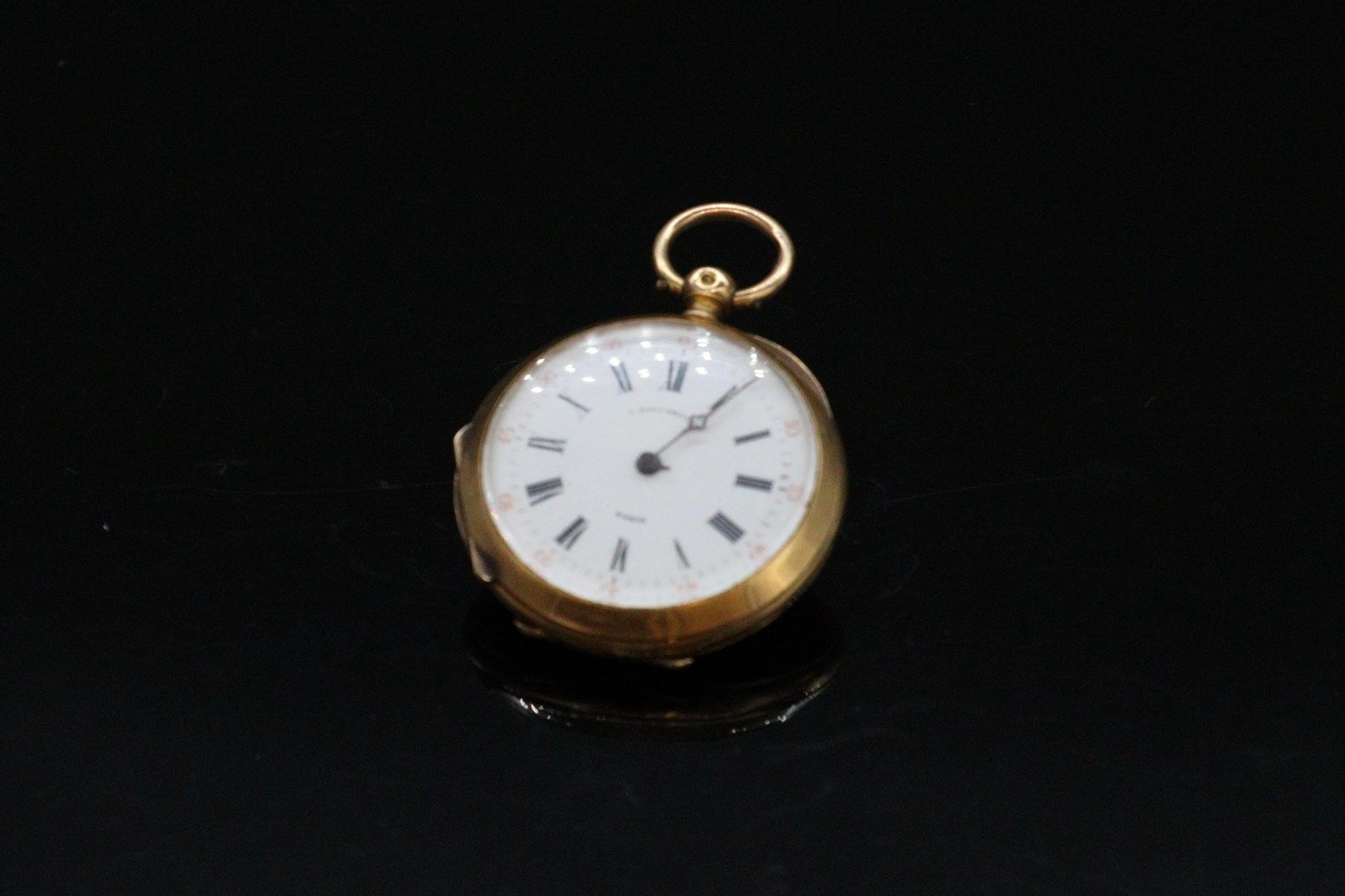 Montre de col en or jaune 18k (750), index... - Lot 476 - Rossini