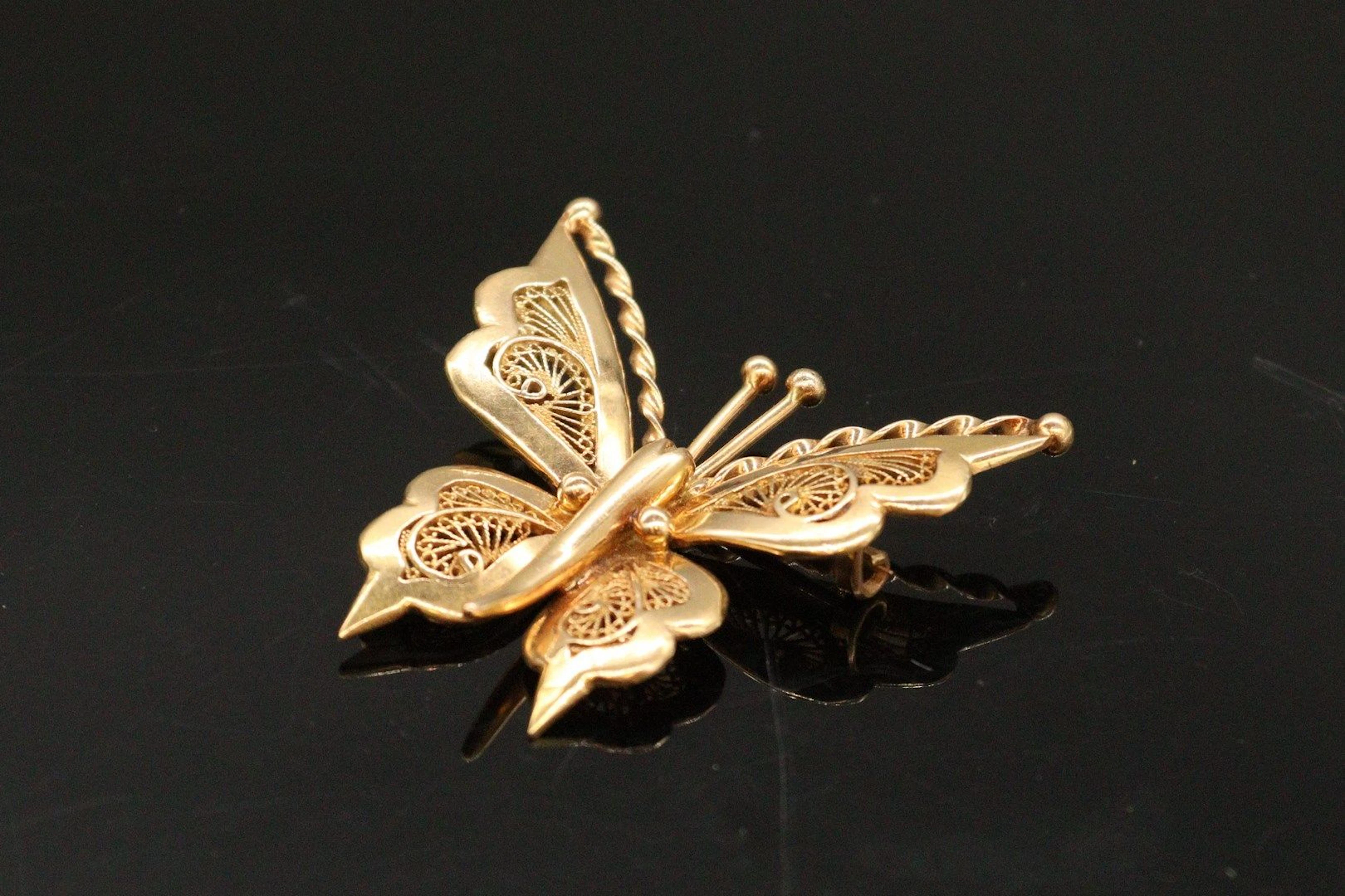 Broche en or jaune 18k (750) figurant un... - Lot 660 - Rossini