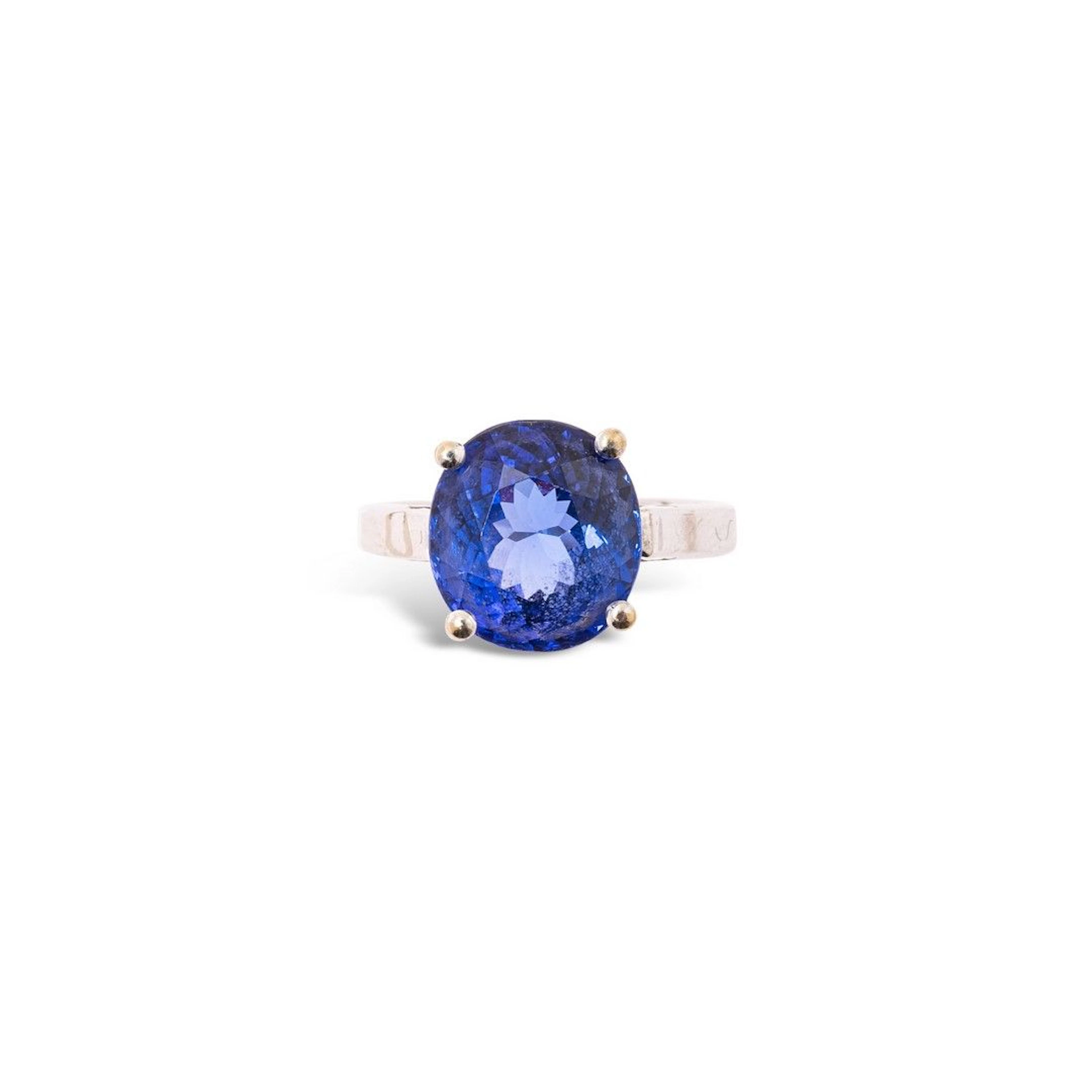 PL 19 Bague en platine, ornée d'une tanzanite... - Lot 417 - Rossini