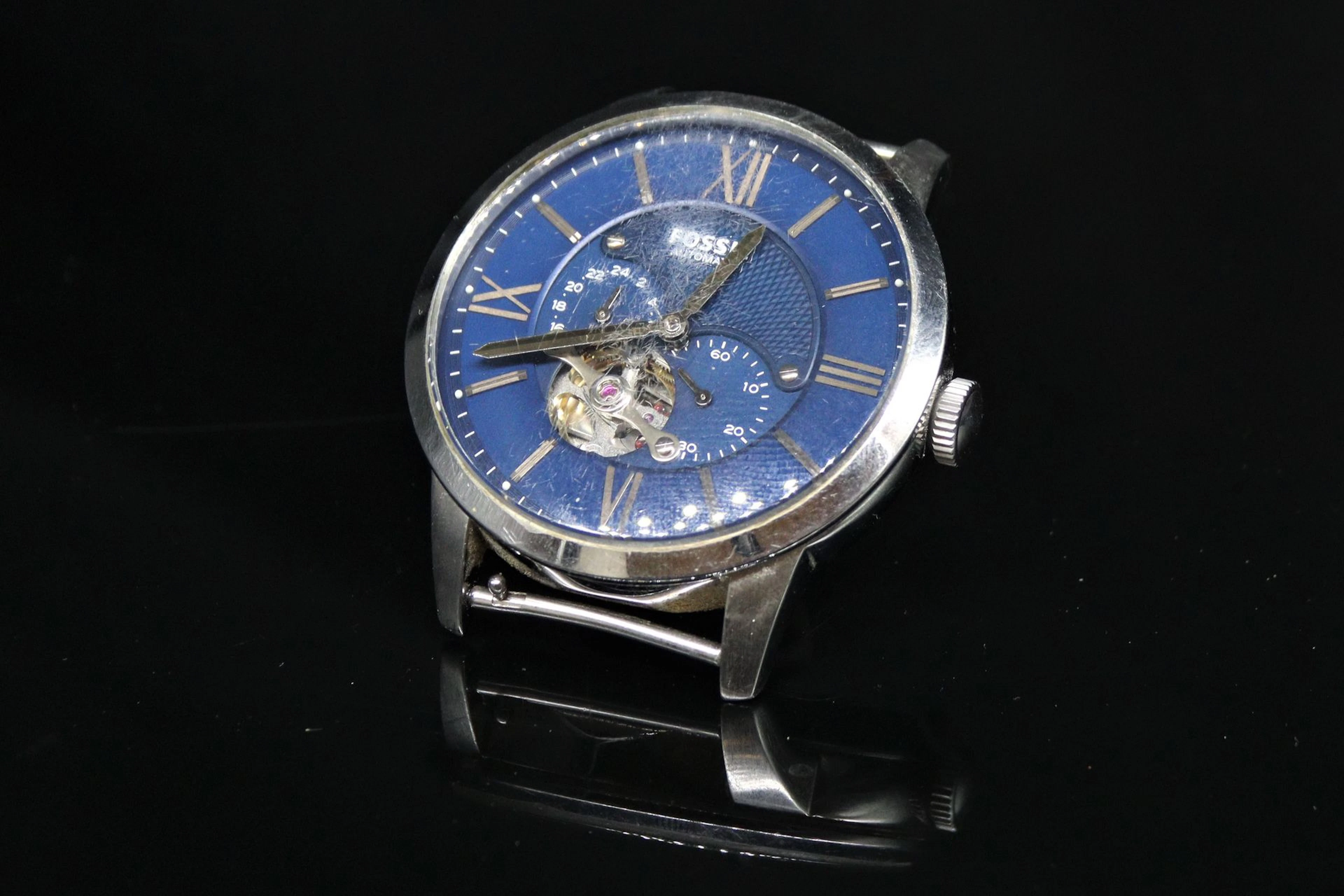FOSSIL Boîtier de montre d'homme en métal,... - Lot 661 - Rossini