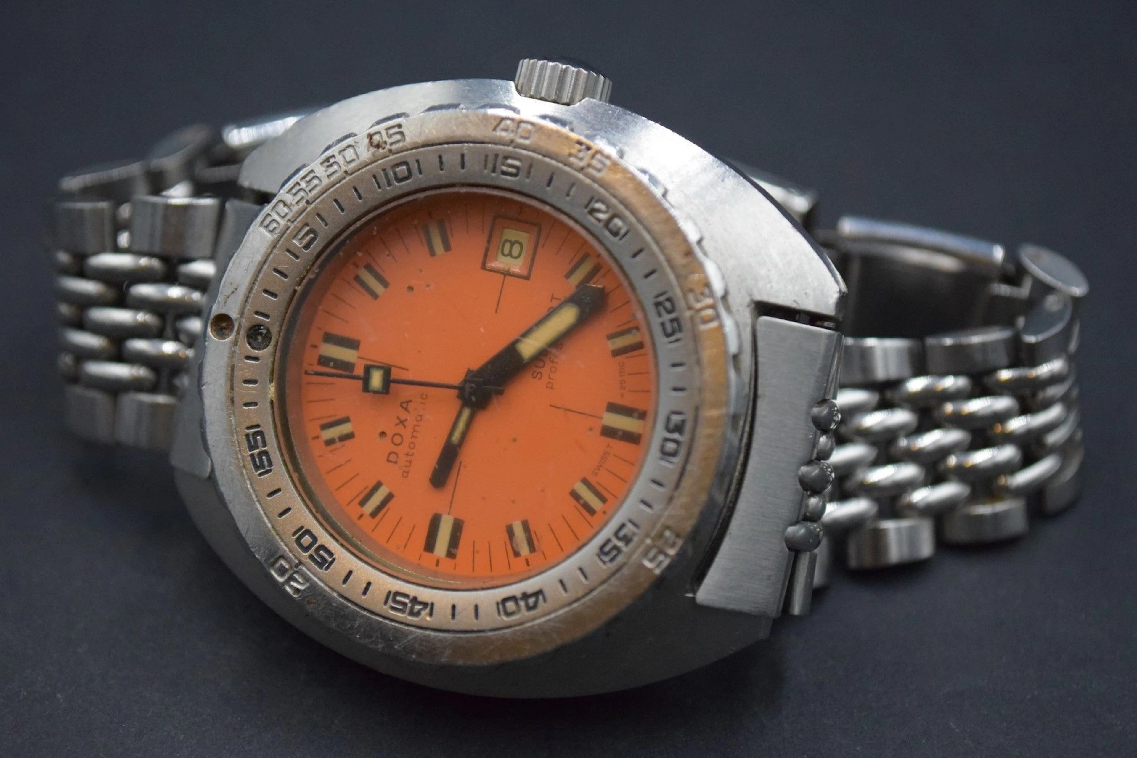 DOXA Montre de plongée, boîtier en métal,... - Lot 822 - Rossini