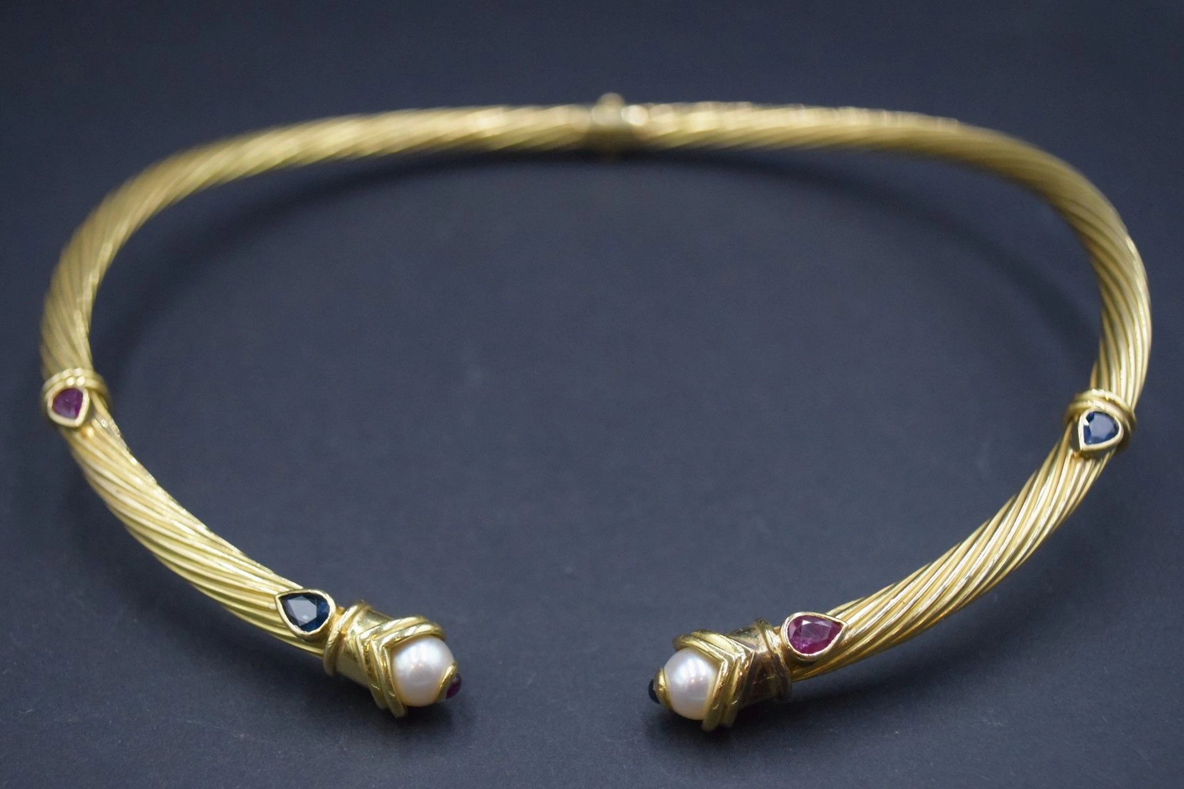 Collier torque torsadé en or 18K (750), les... - Lot 271 - Rossini