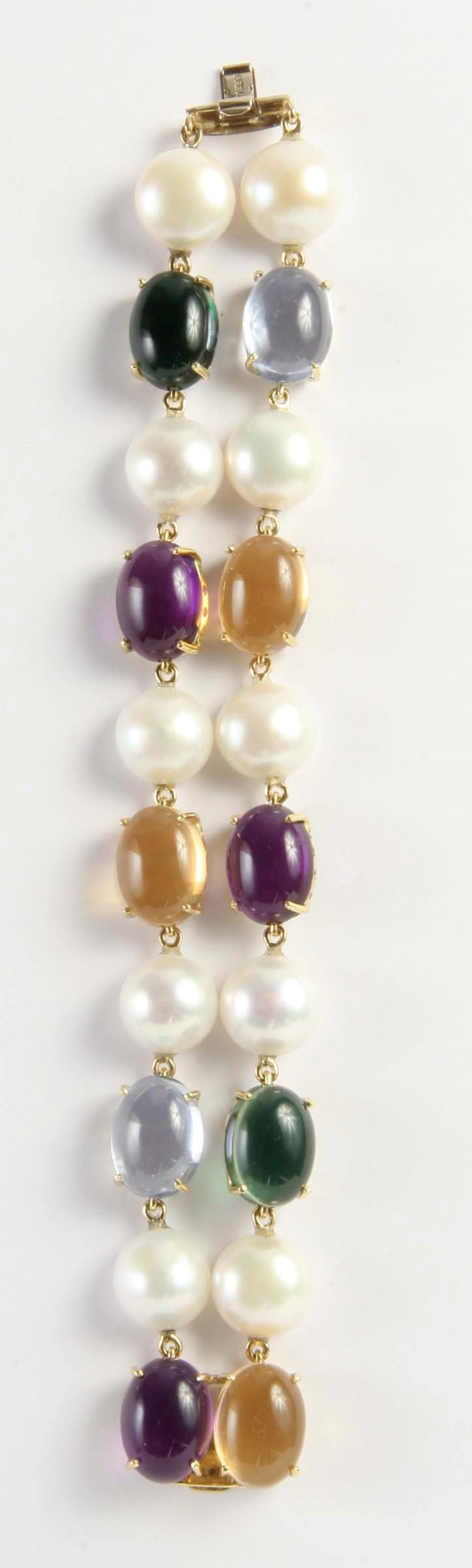 Bracciale con quarzi, ametiste, tormaline e perle