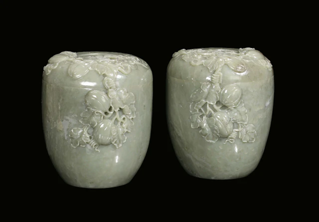 A pair of carved green nephritis vases, China, 20th century