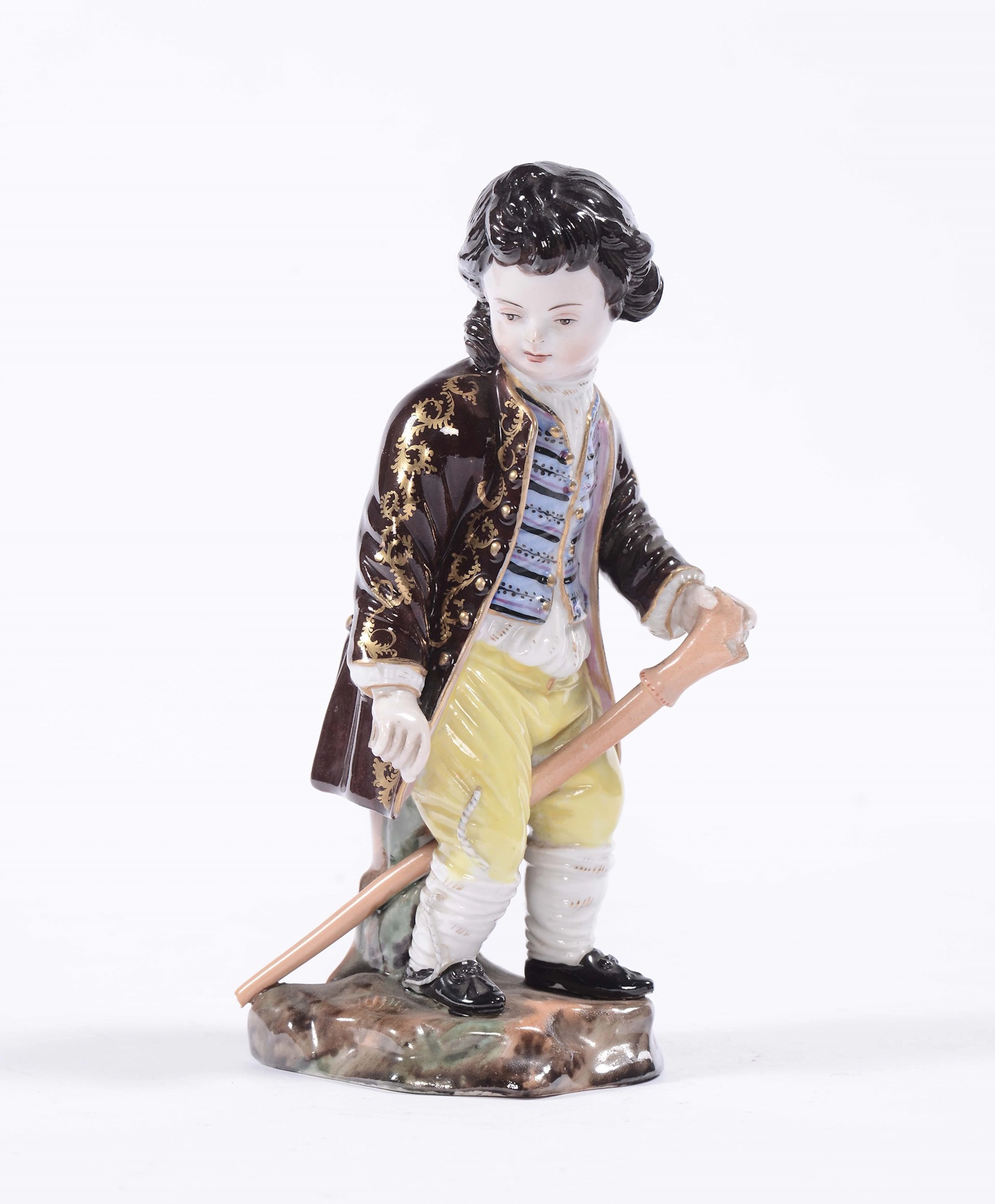 Figura in porcellana policroma di giovane nobile con bastone e giubbetto