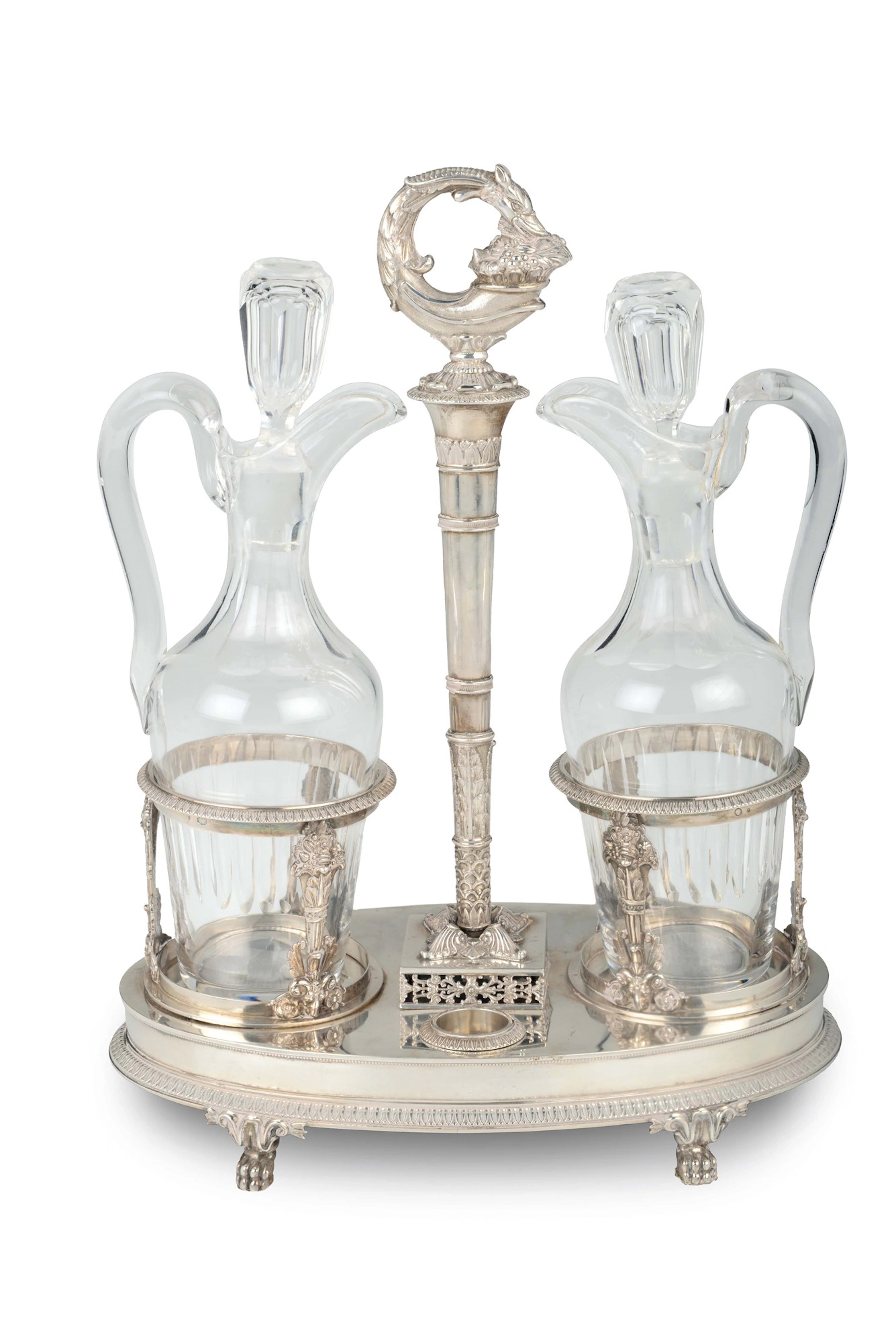 A molten and chiselled silver oil jug, France, early 19th century
