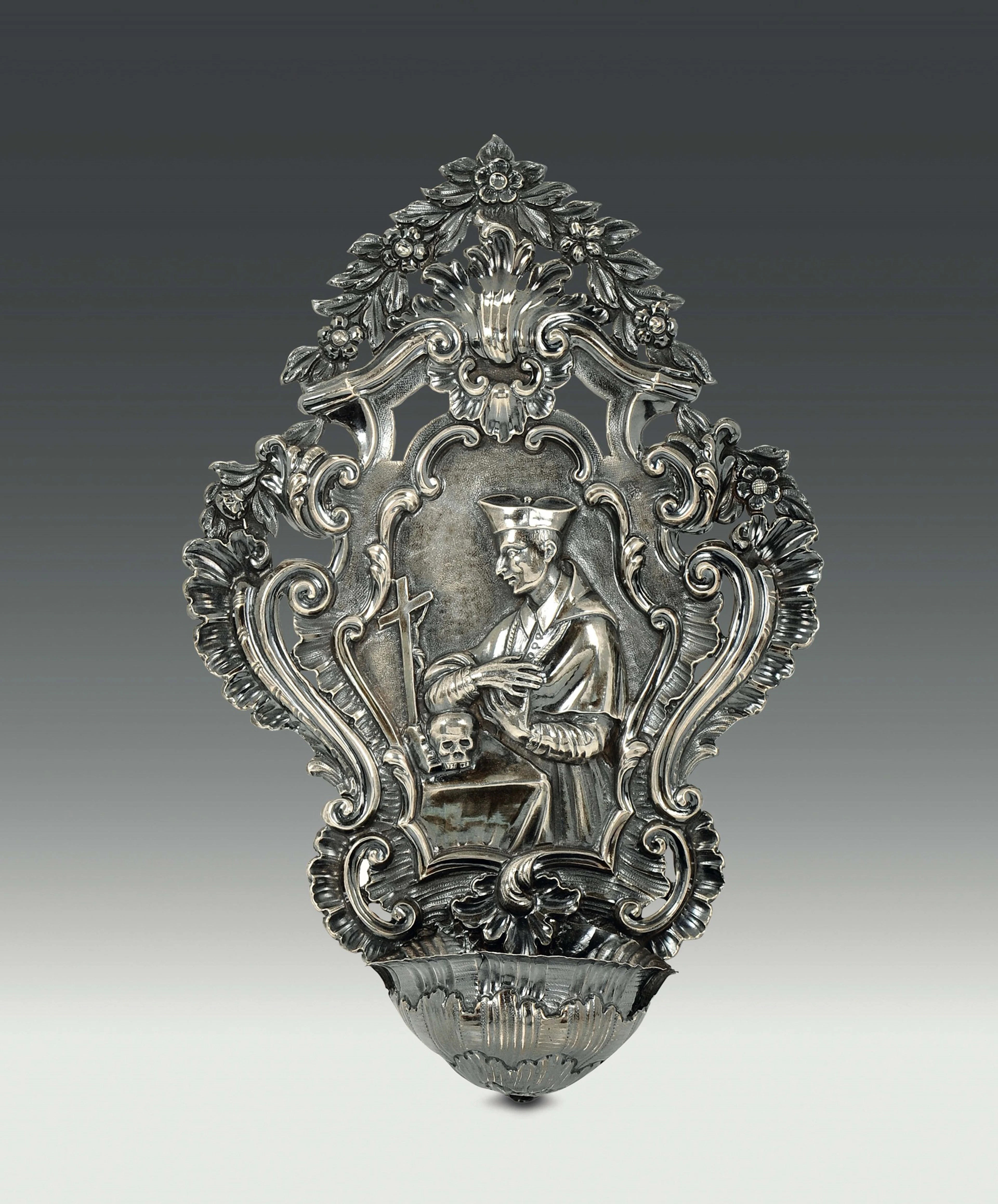 A holy water font in embossed and chiselled silver, Genova, Torretta