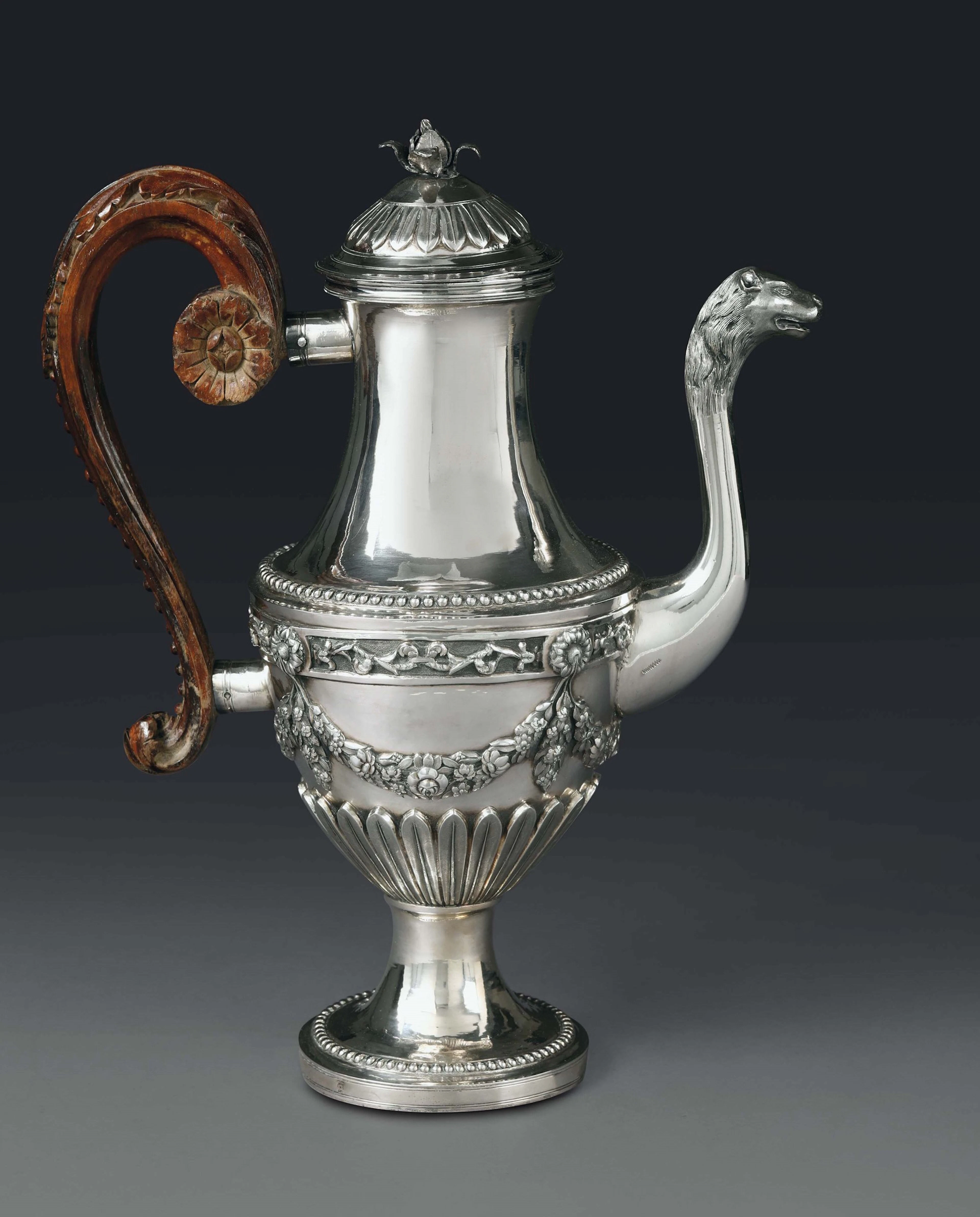 A coffee pot in embossed and chiselled silver, Genoa, Torretta stamp
