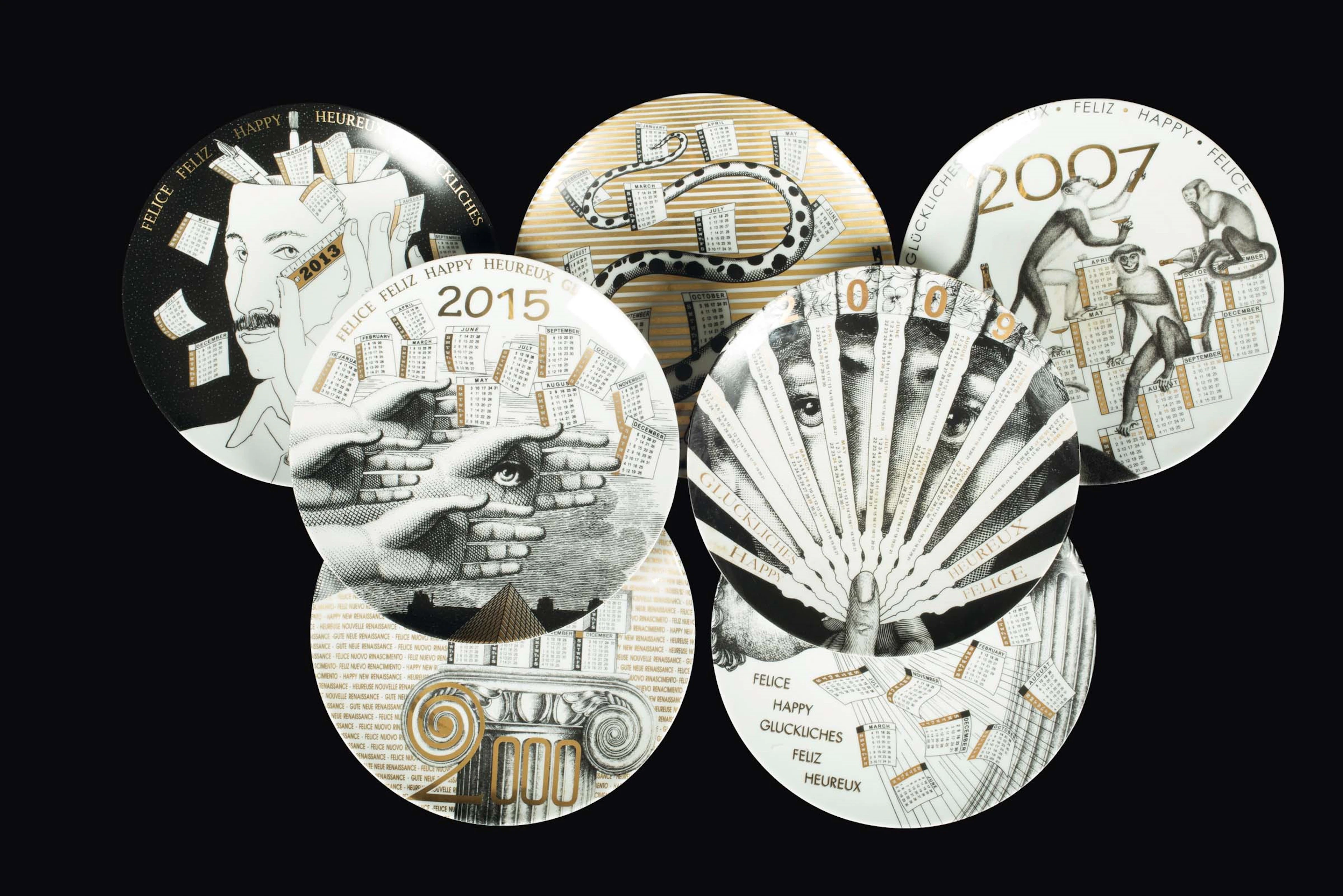 Fornasetti, Milano, 1990s. Seven plates from the Calendario series