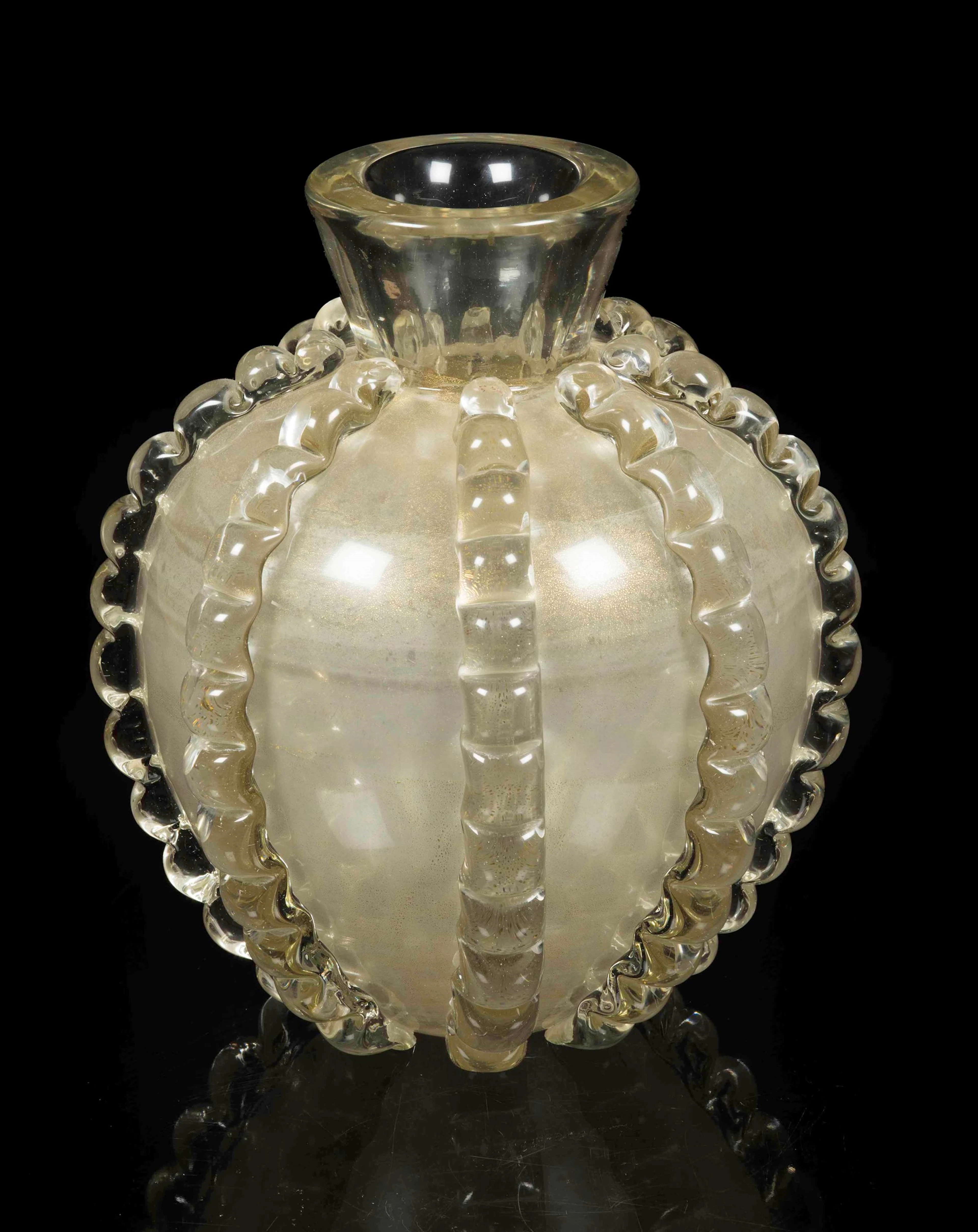 Ferro Toso Seguso, Murano, 1940 ca. A spherical vase in clear heavy