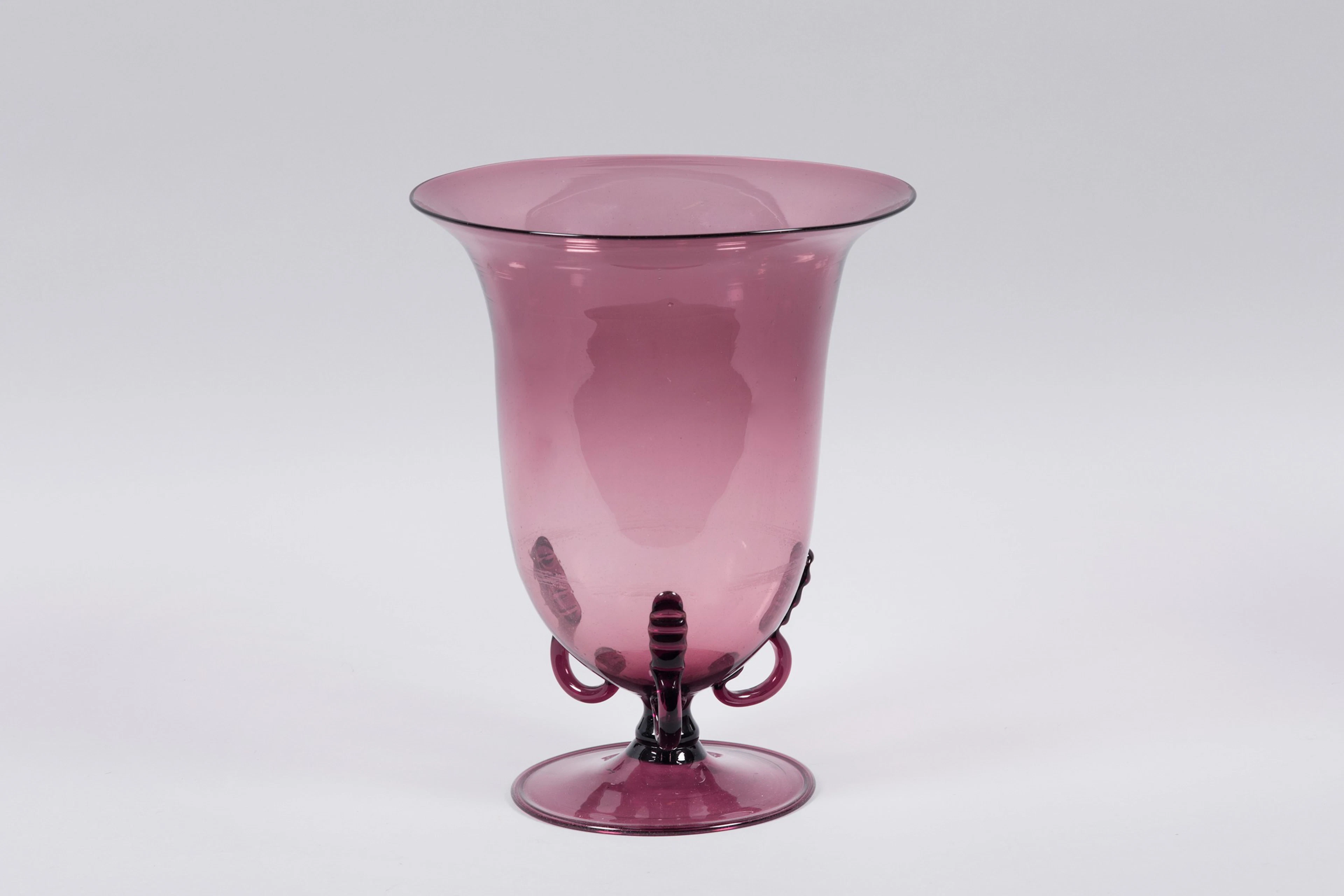 Murano, 1930 ca. A large bell-shaped vase in blown glass with applied