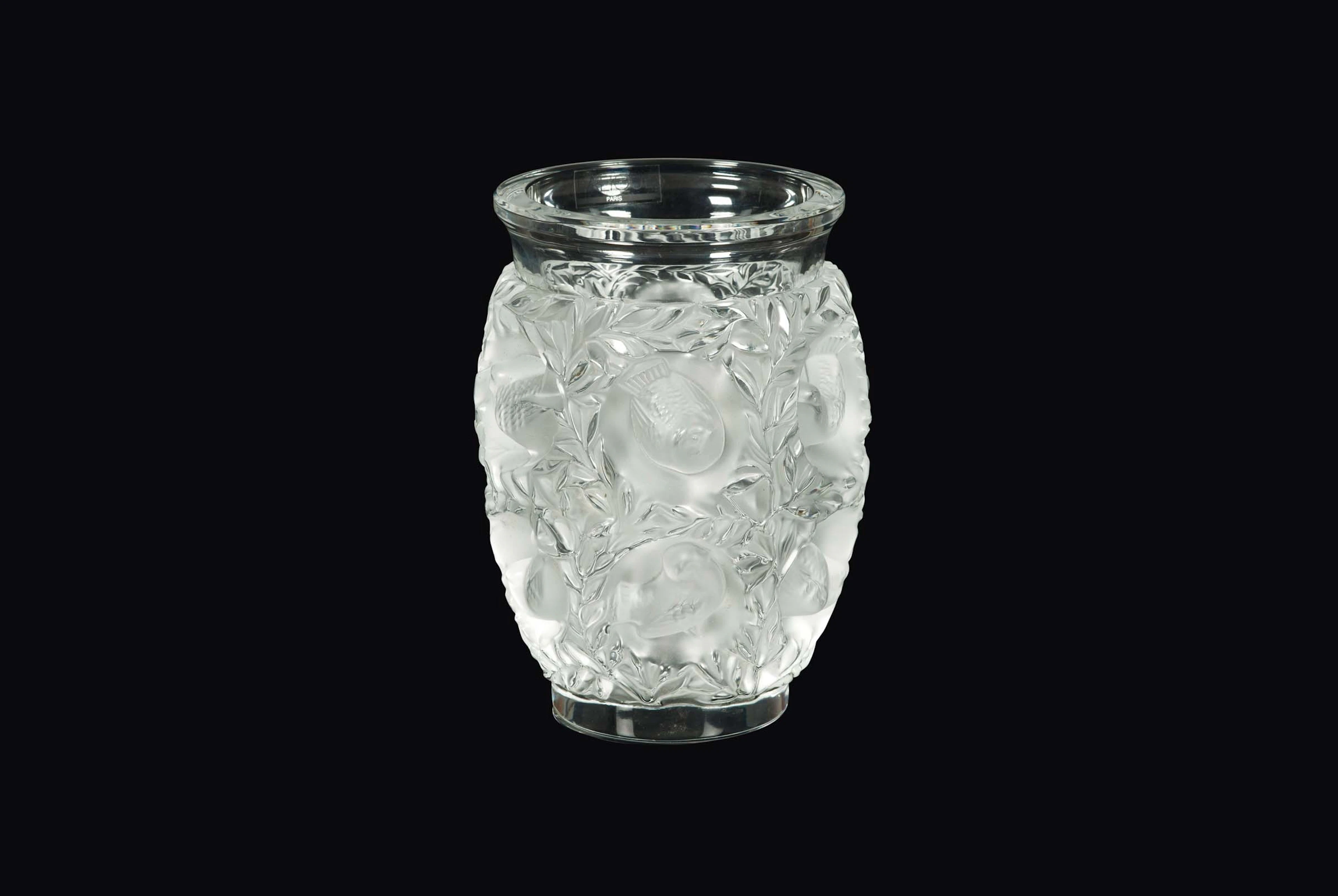 Lalique, France, 19th century. A crystal vase with a large sanded