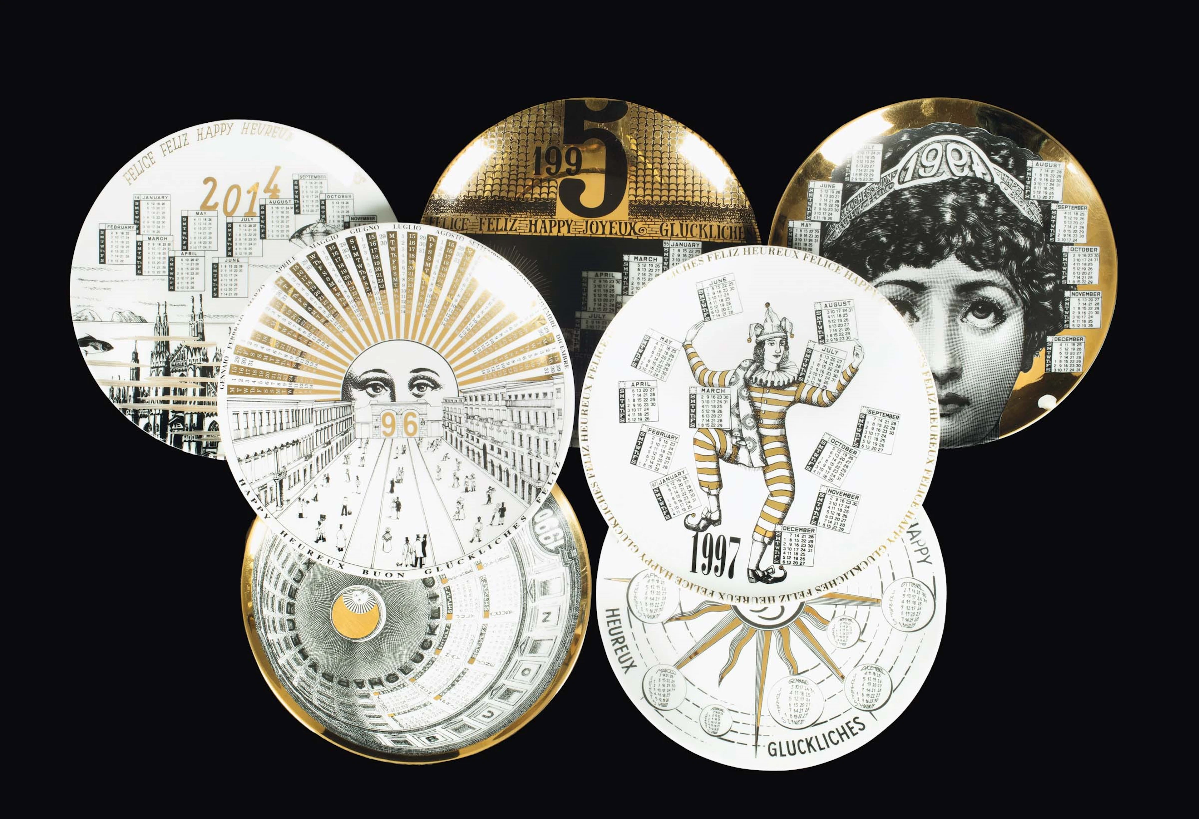Fornasetti, Milano, 1990s. Seven plates from the Calendario series