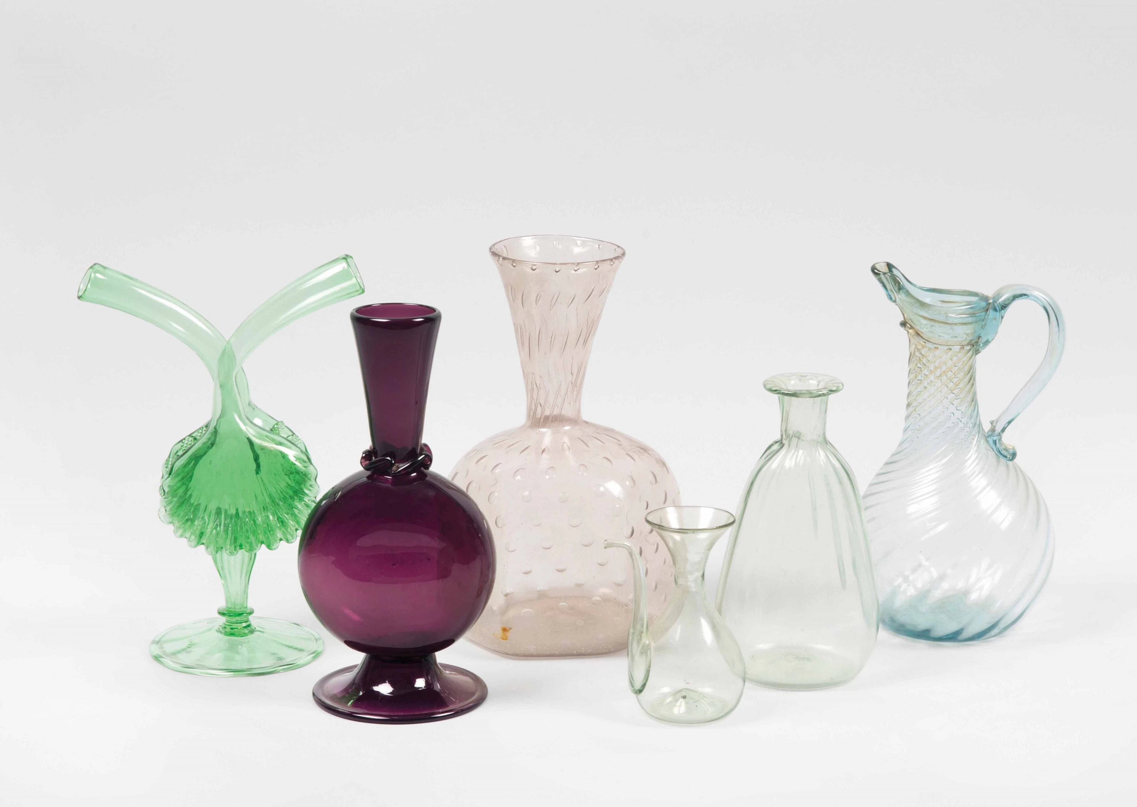 Murano, 1920. A lot made up by 6 bottles, pitchers and a vinegar bottle