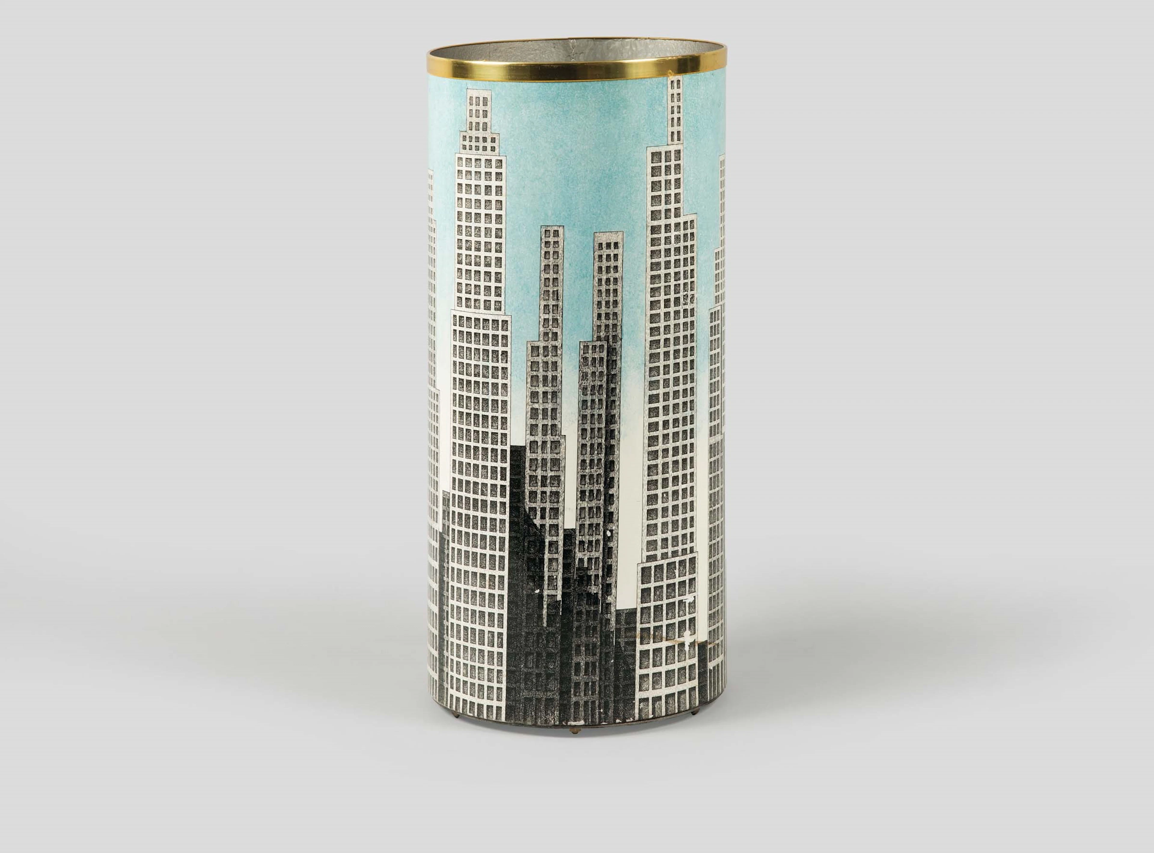Fornasetti, Milan, 1980s. A cylindric metal umbrella stand with a