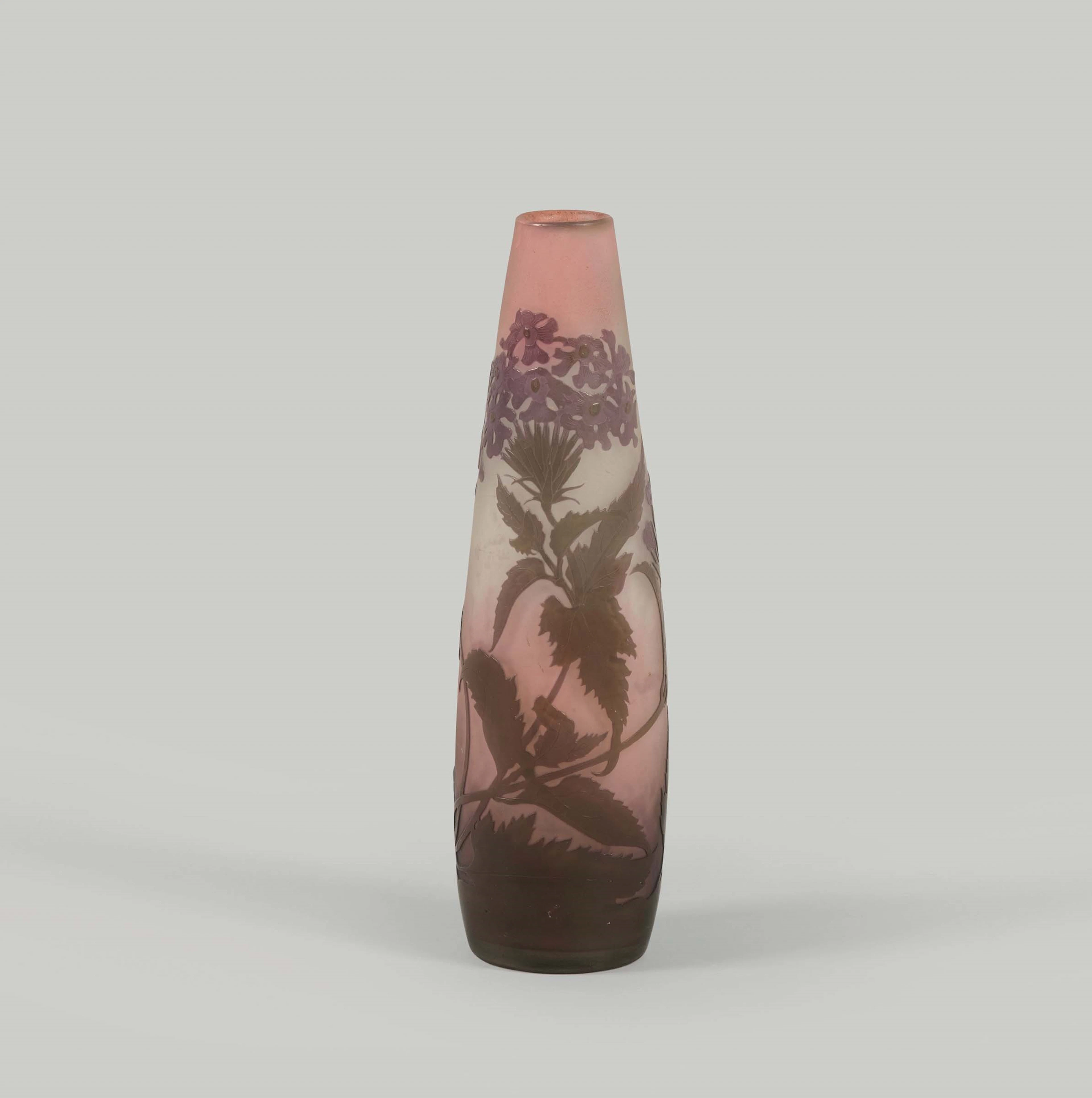 Gall�, France, 1900 ca. A cylindrical vase in blown glass with a cameo