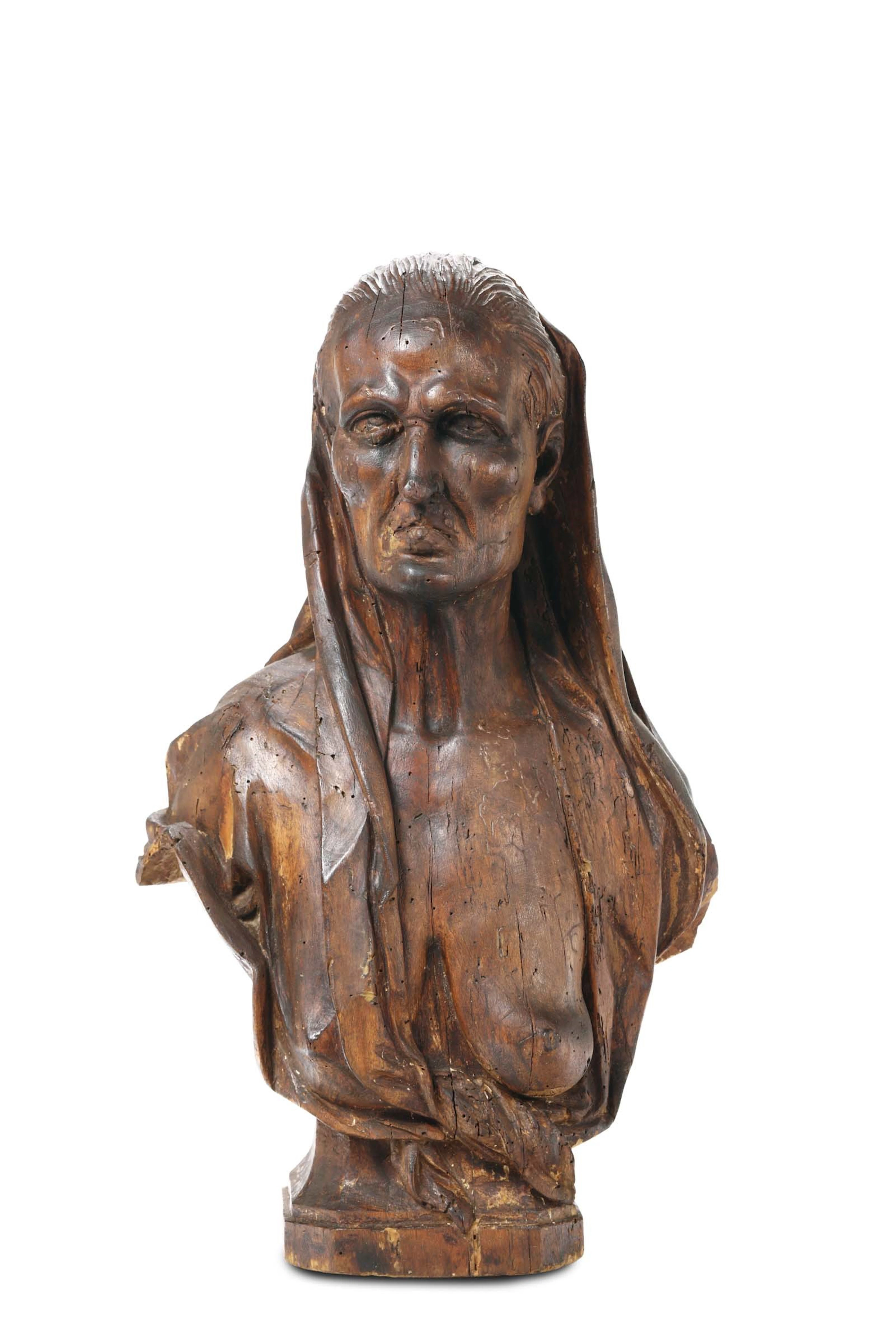 An allegoric female figure in carved wood. Italian sculptor of the