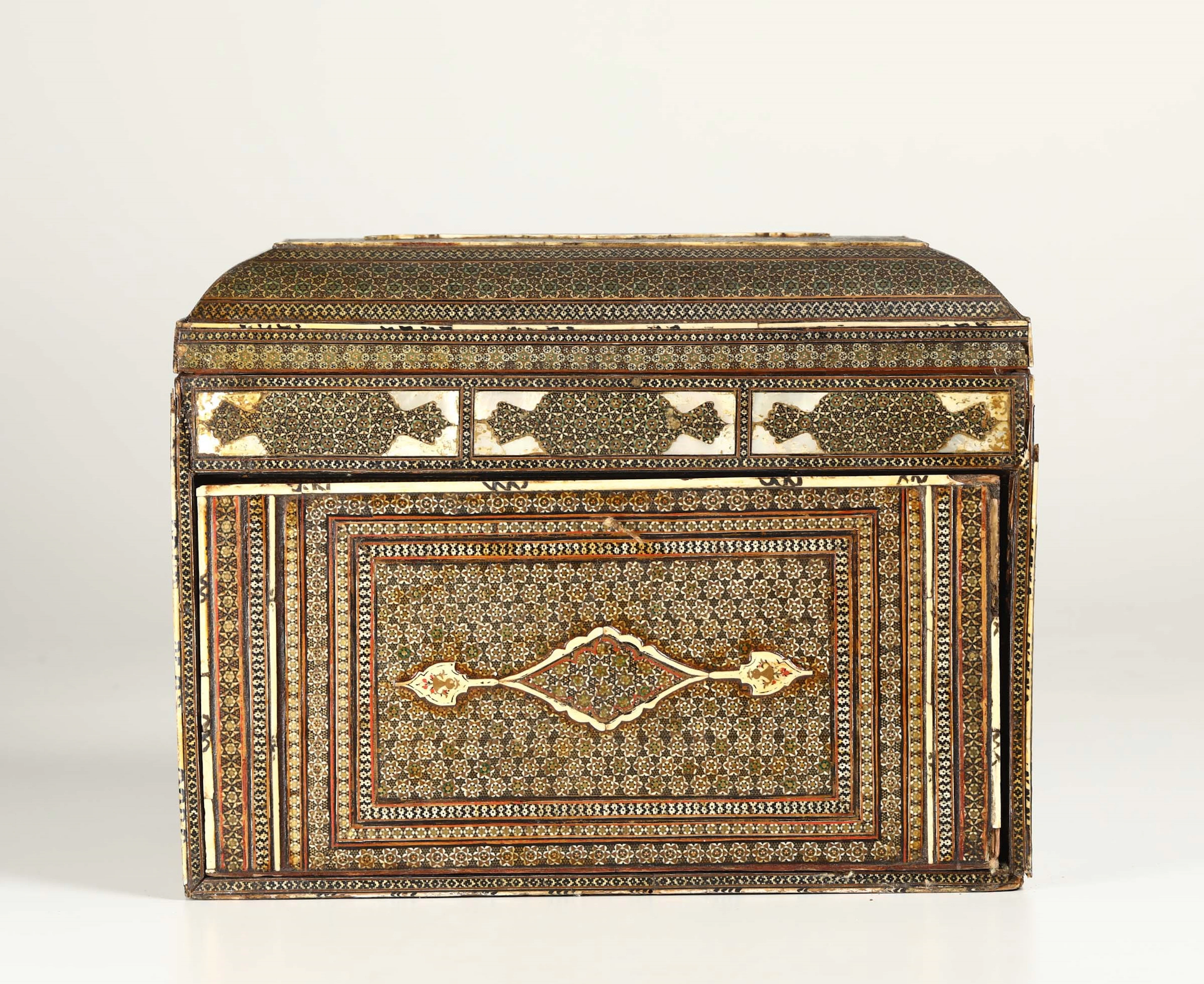 A travel coin cabinet in various woods, ivory and mother-of-pearl.