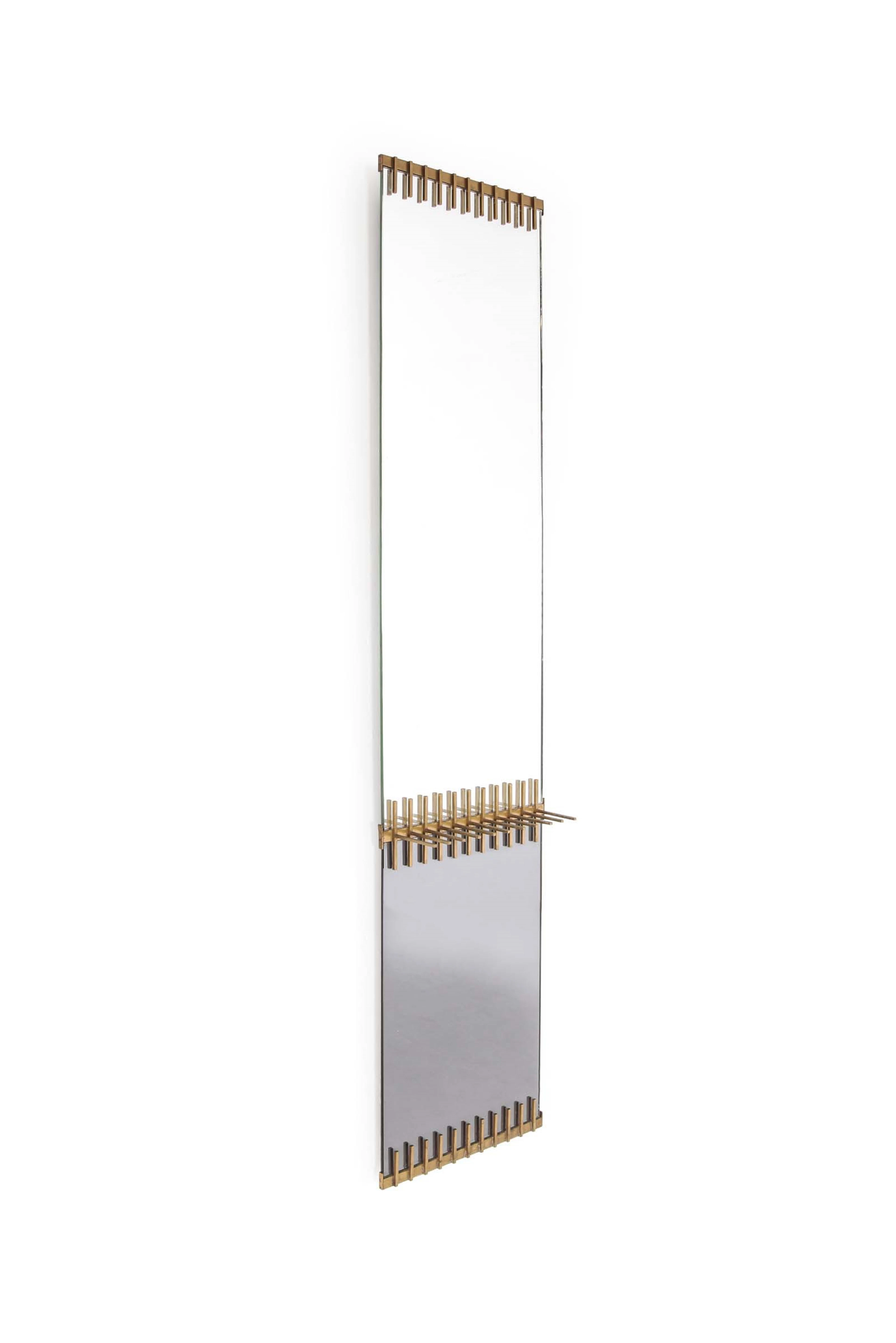 Ettore Sottsass, an important and rare mirror with a brass frame