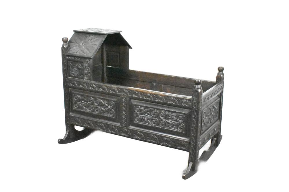 English 19th Century Jacobean Revival Bog Carved Rocking Cradle