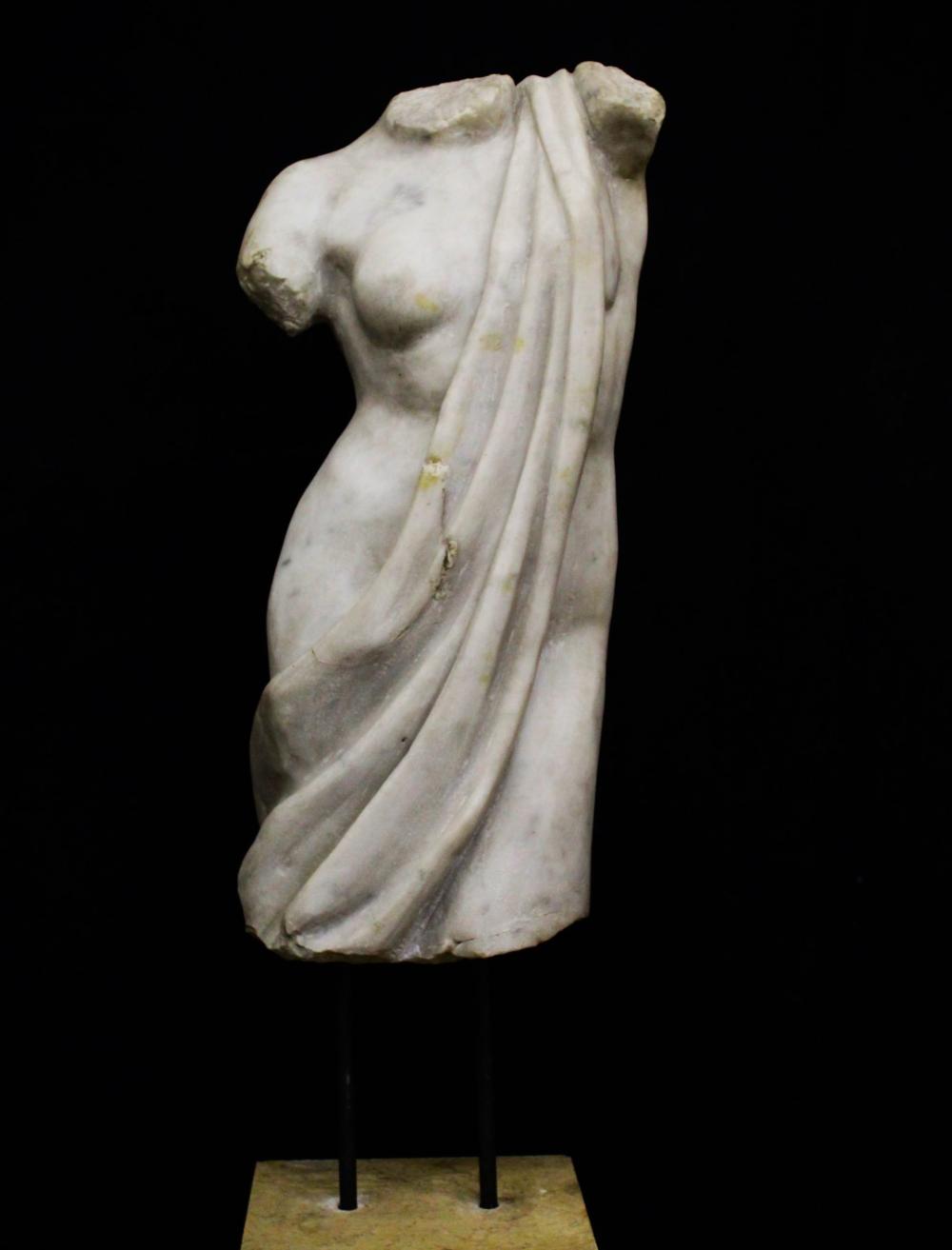 Torso of Nike sculpture in statuary white marble