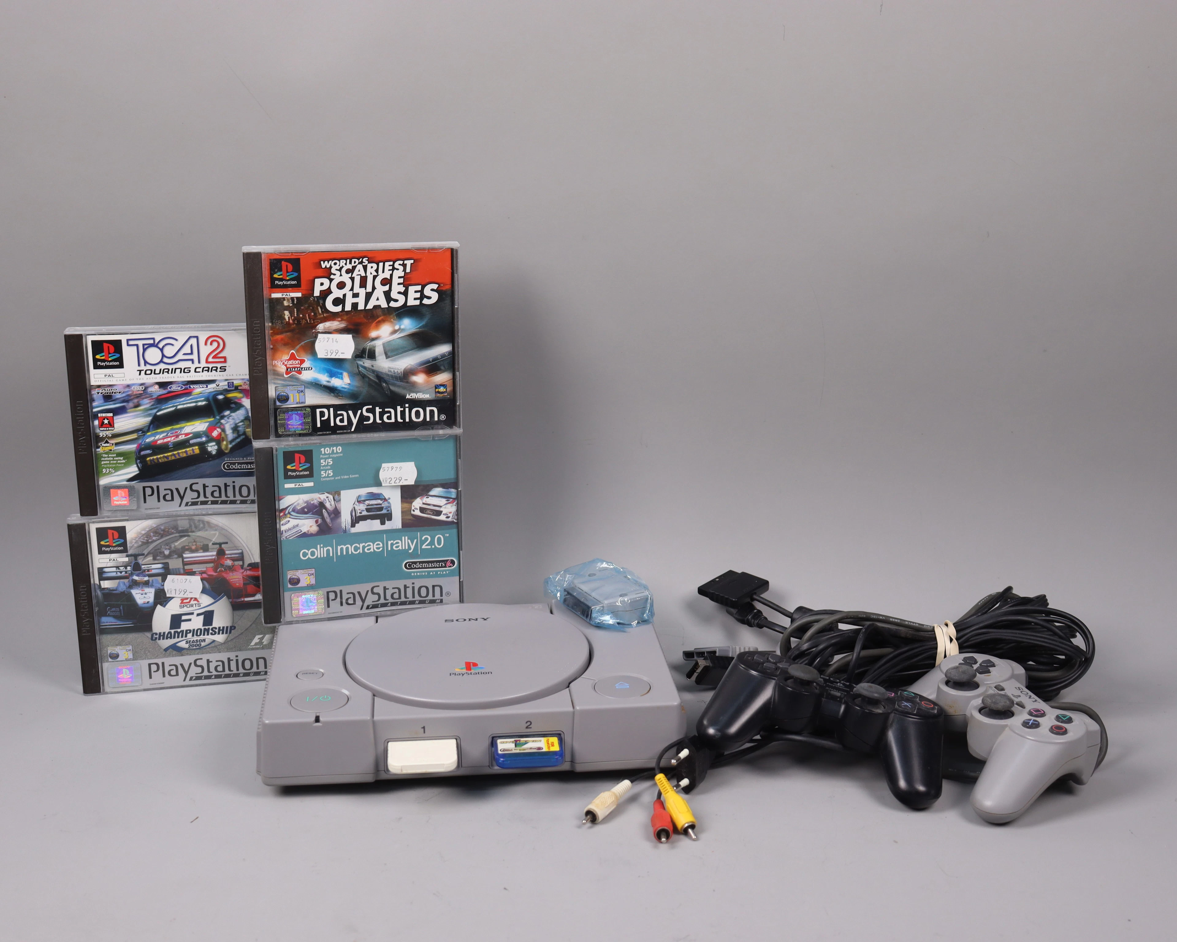 Sony Playstation 1 med tillbehör och spel