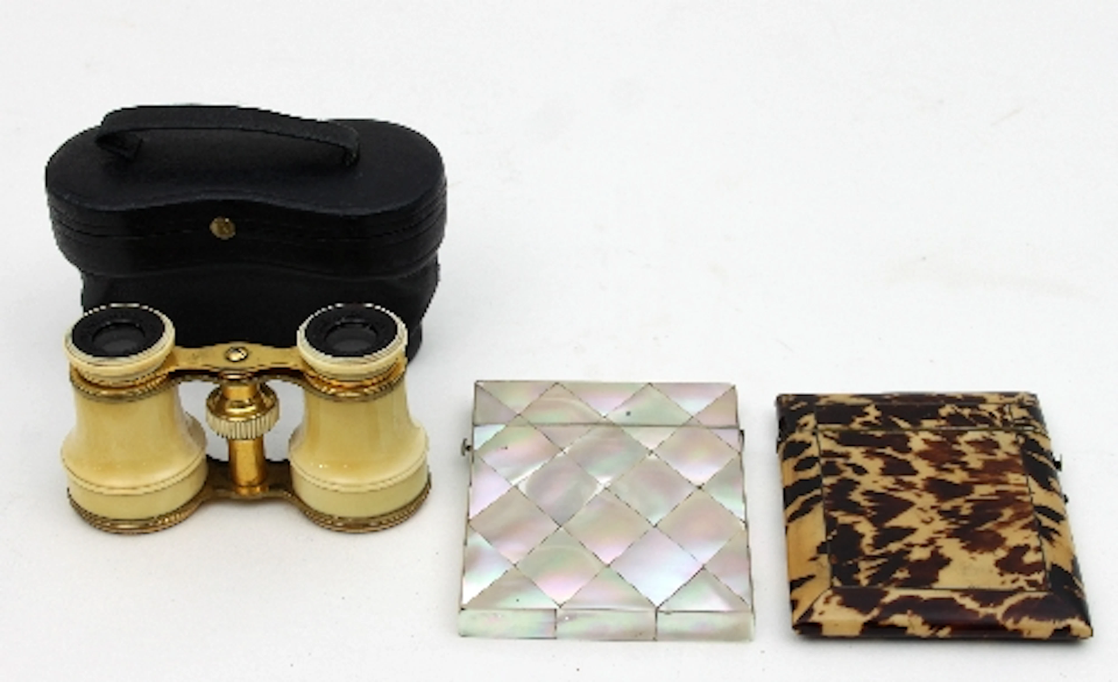 A pair of ivory cased opera glasses