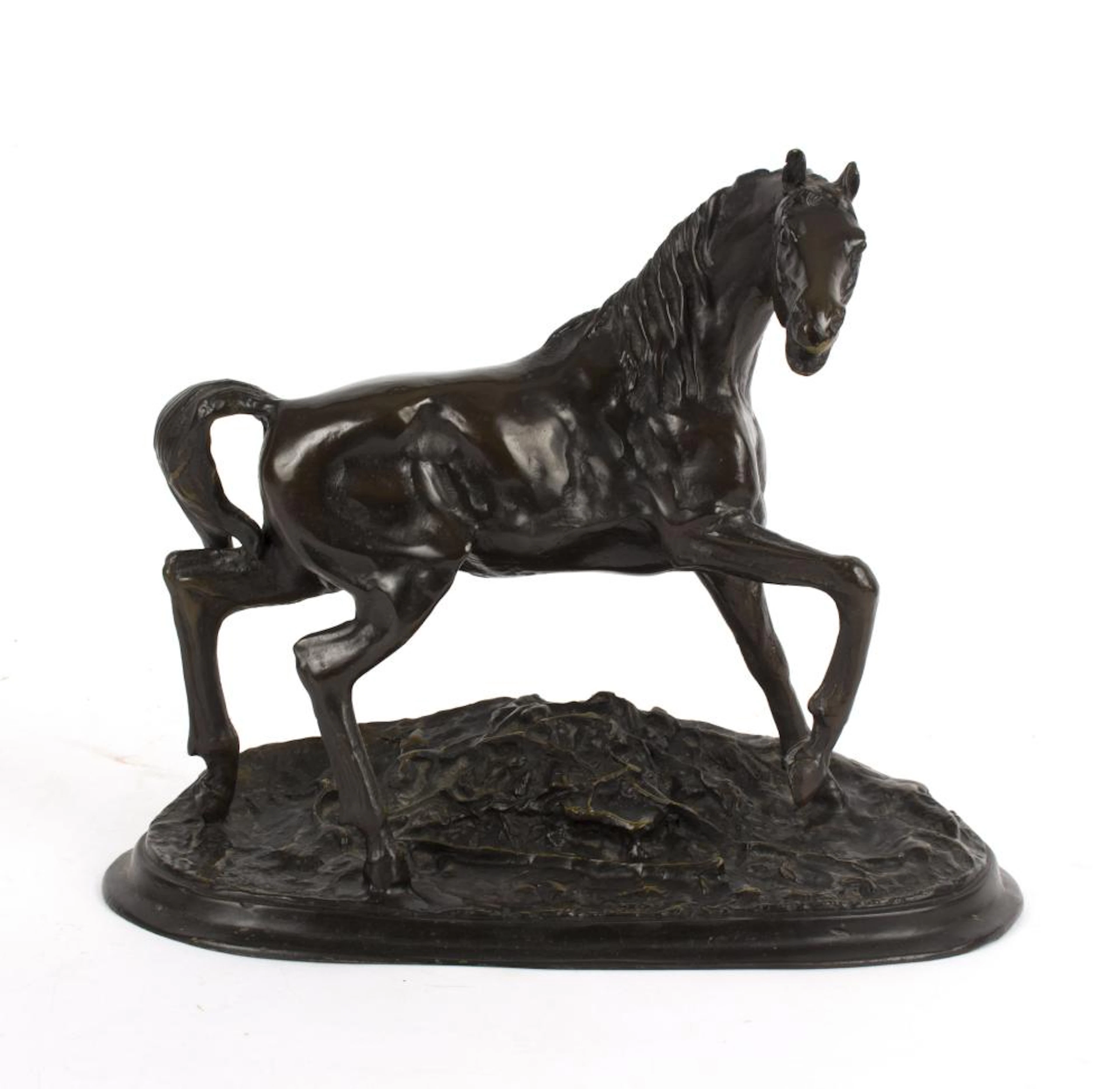 A bronze figure of a prancing horse, after P J Mene, 30cm high