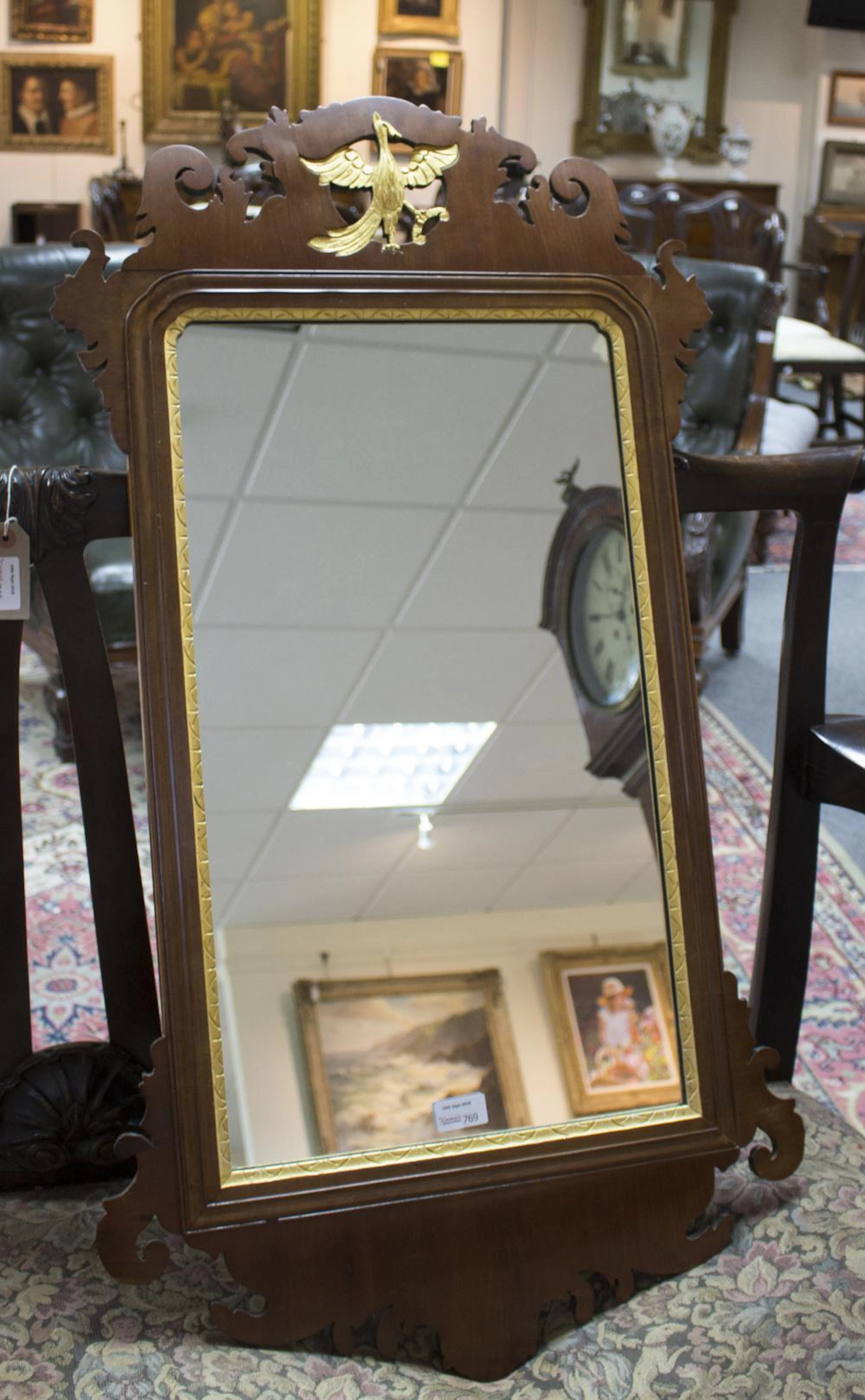 A George III fret carved wall mirror