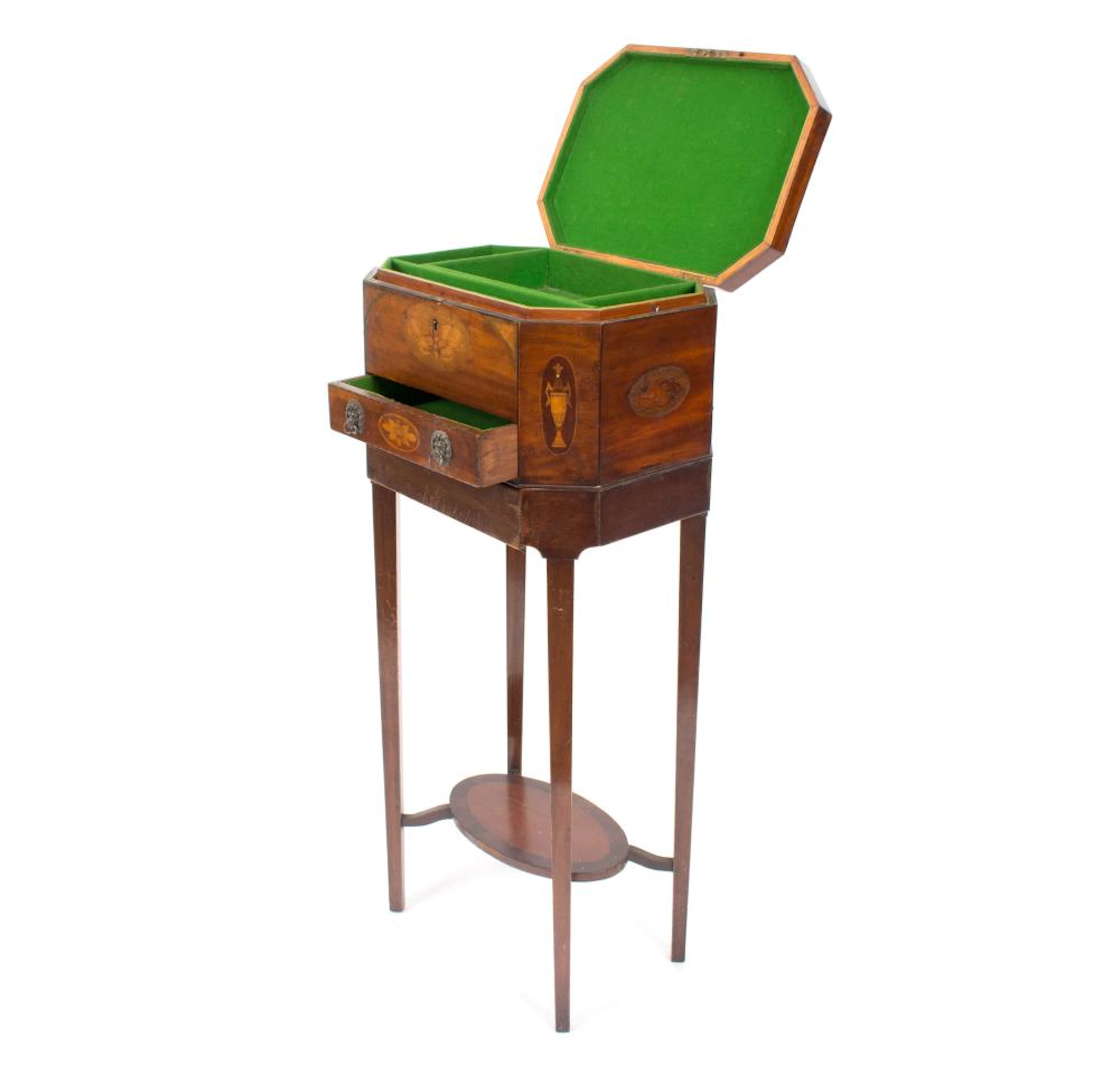A George III inlaid teapoy of canted rectangular shape with shell