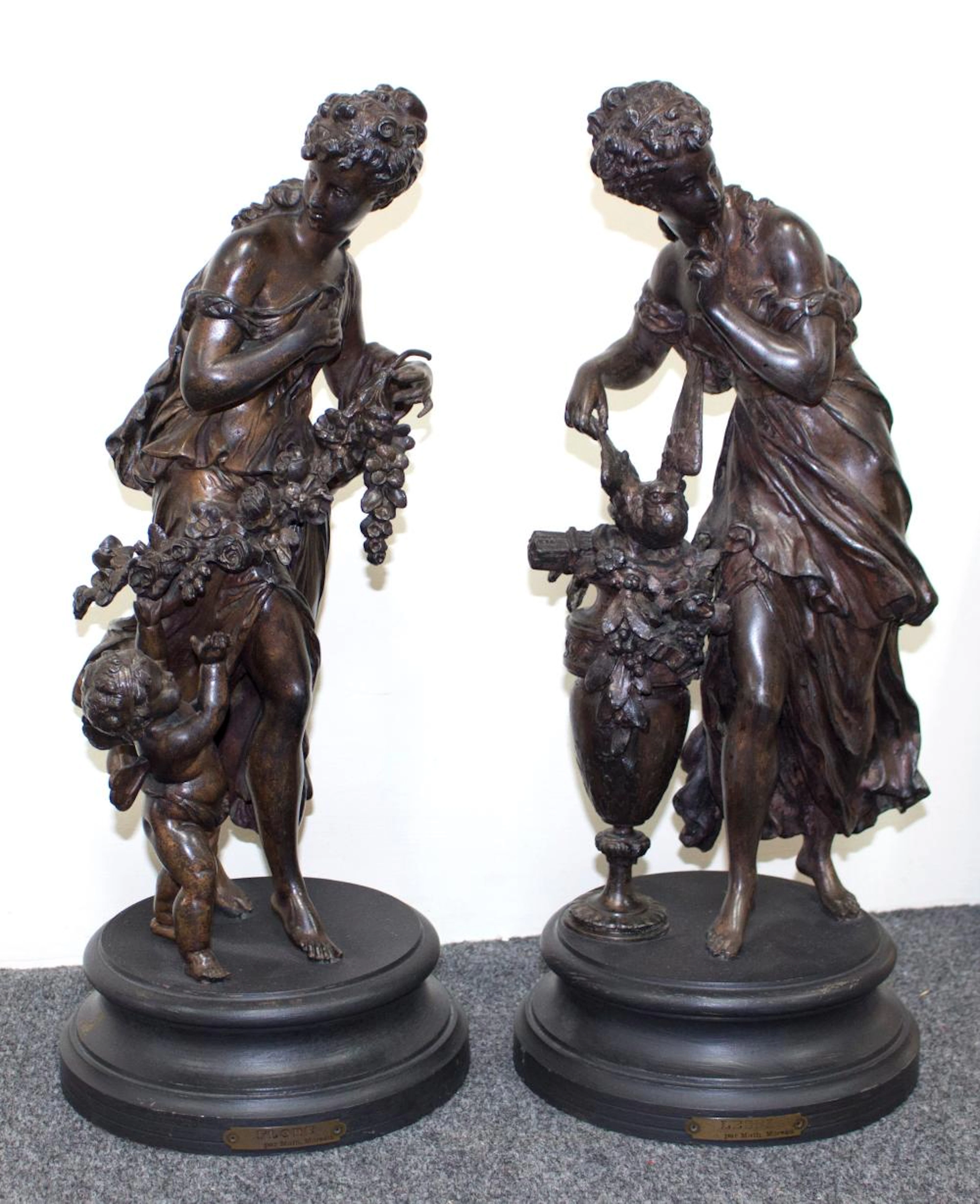 Two bronzed metal figures