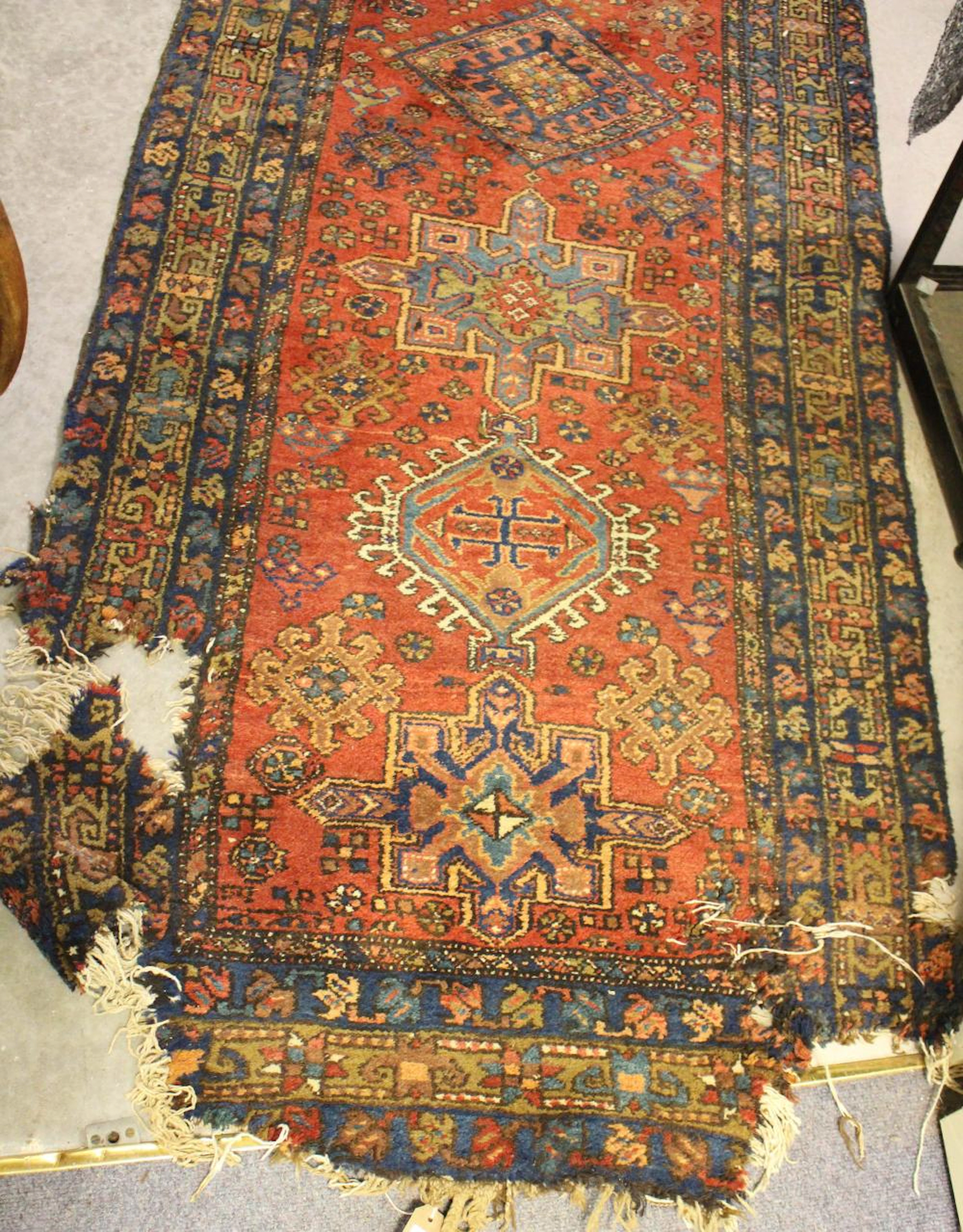 A Karadja runner, 168cm x 91.5cm (one end a/f)