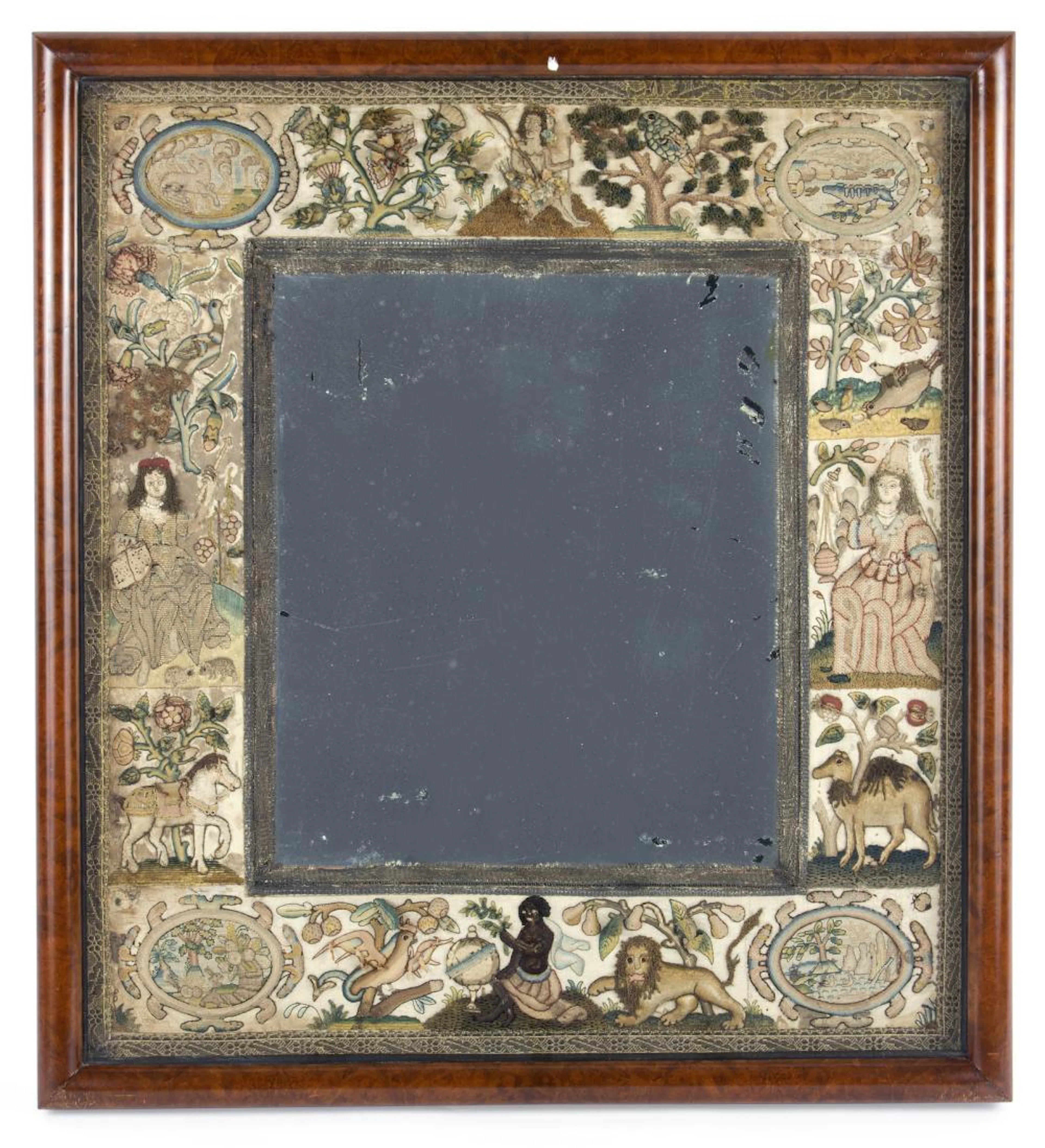 A Charles II needlework mirror