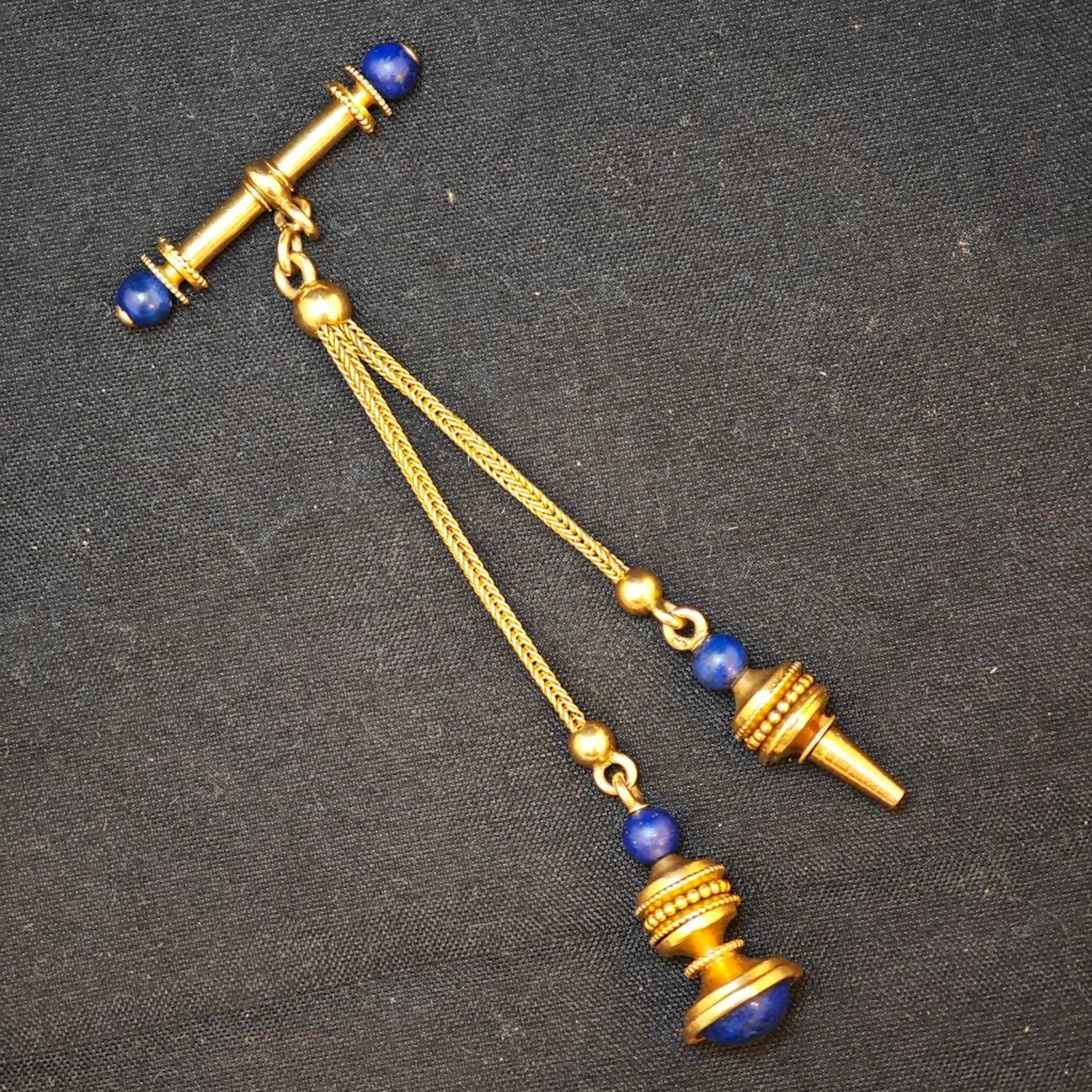 Yellow gold 750‰ gousset watch key chain adorned with lapis - Lot 109