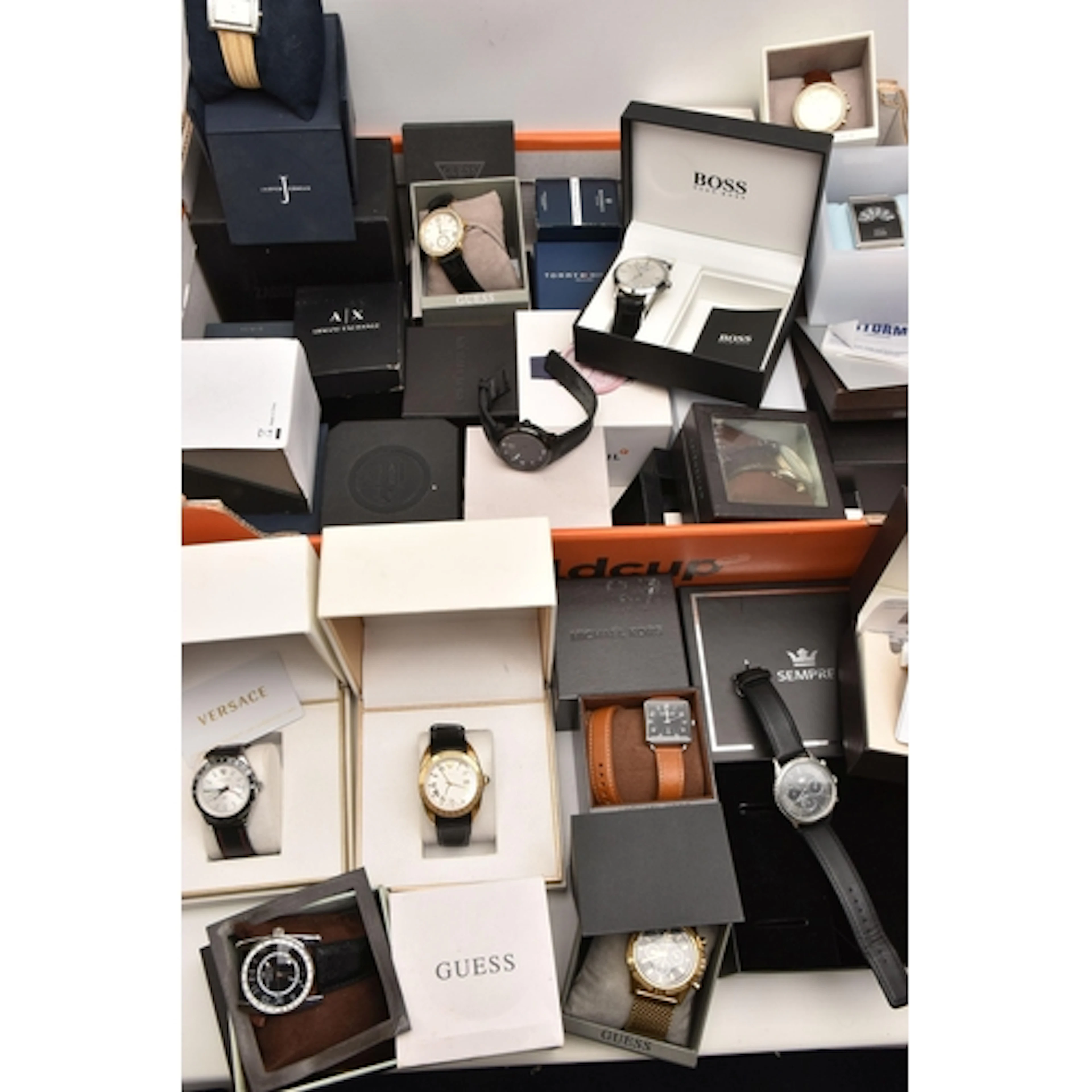 A LARGE BOX OF ASSORTED FASHION WRISTWATCHES, a large assort...