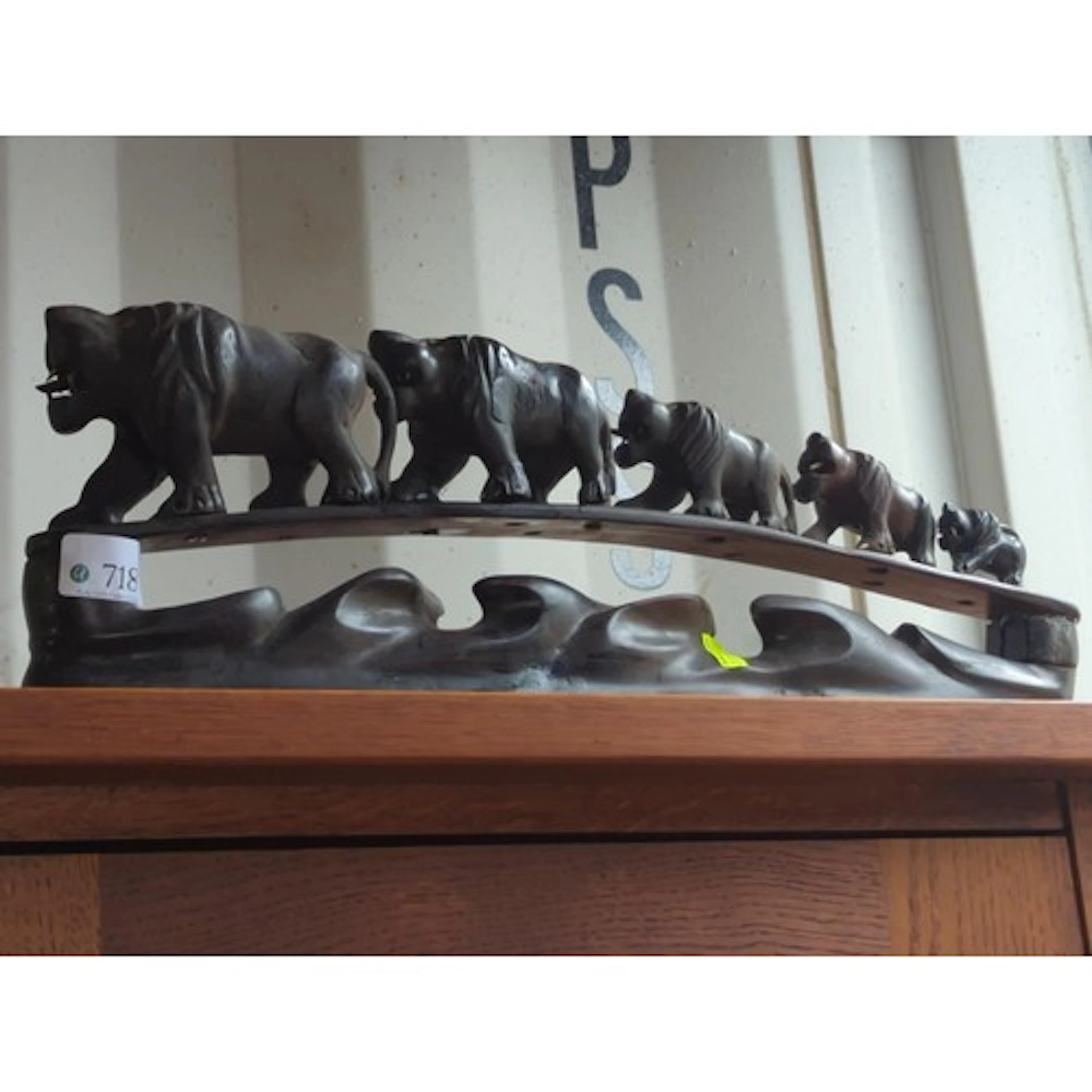 Wooden sculpture of 5 graduated Lions