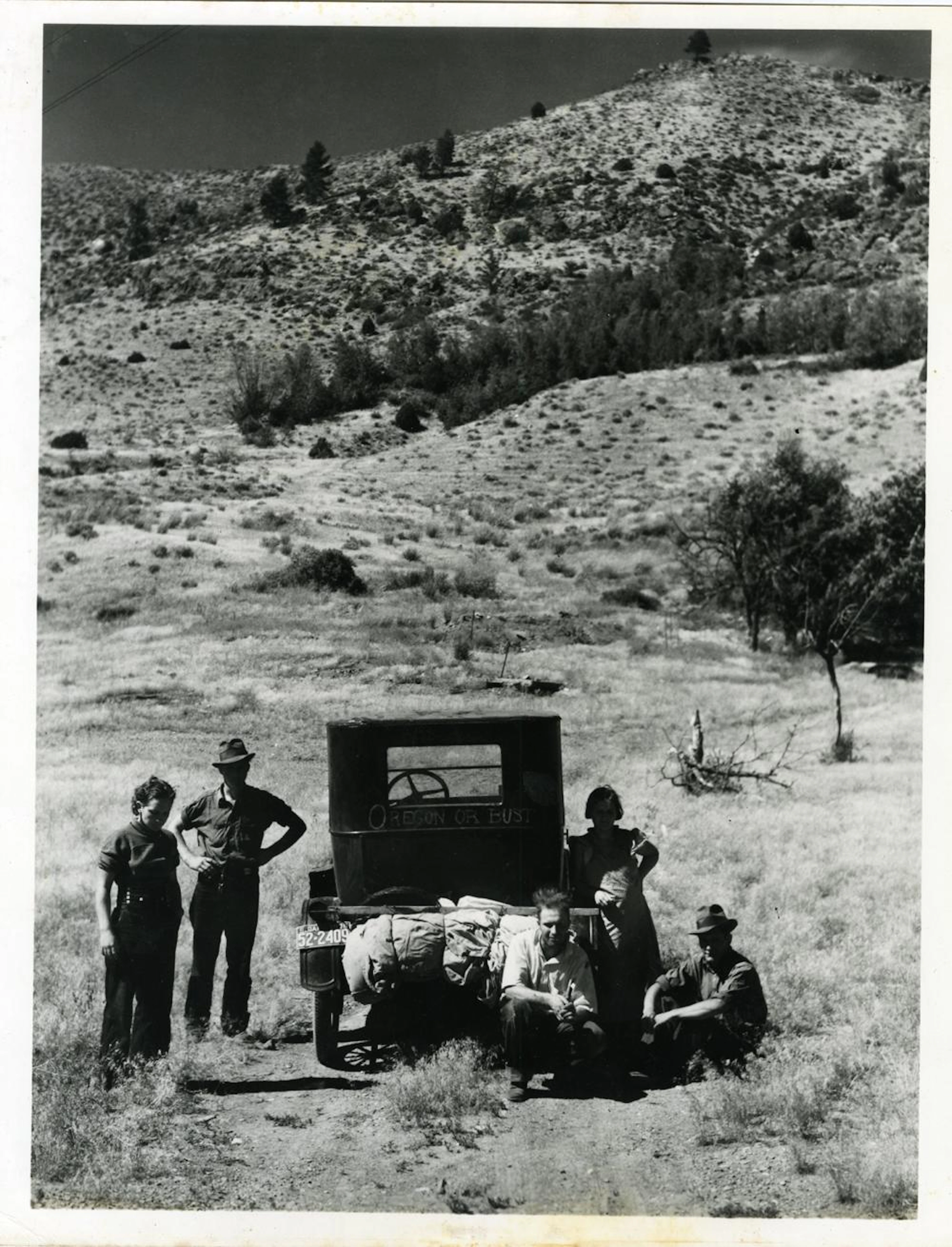 ARTHUR ROTHSTEIN, MIGRANT FAMILY FROM S. DAKOTA MOVING WEST. VINTAGE PRINT.