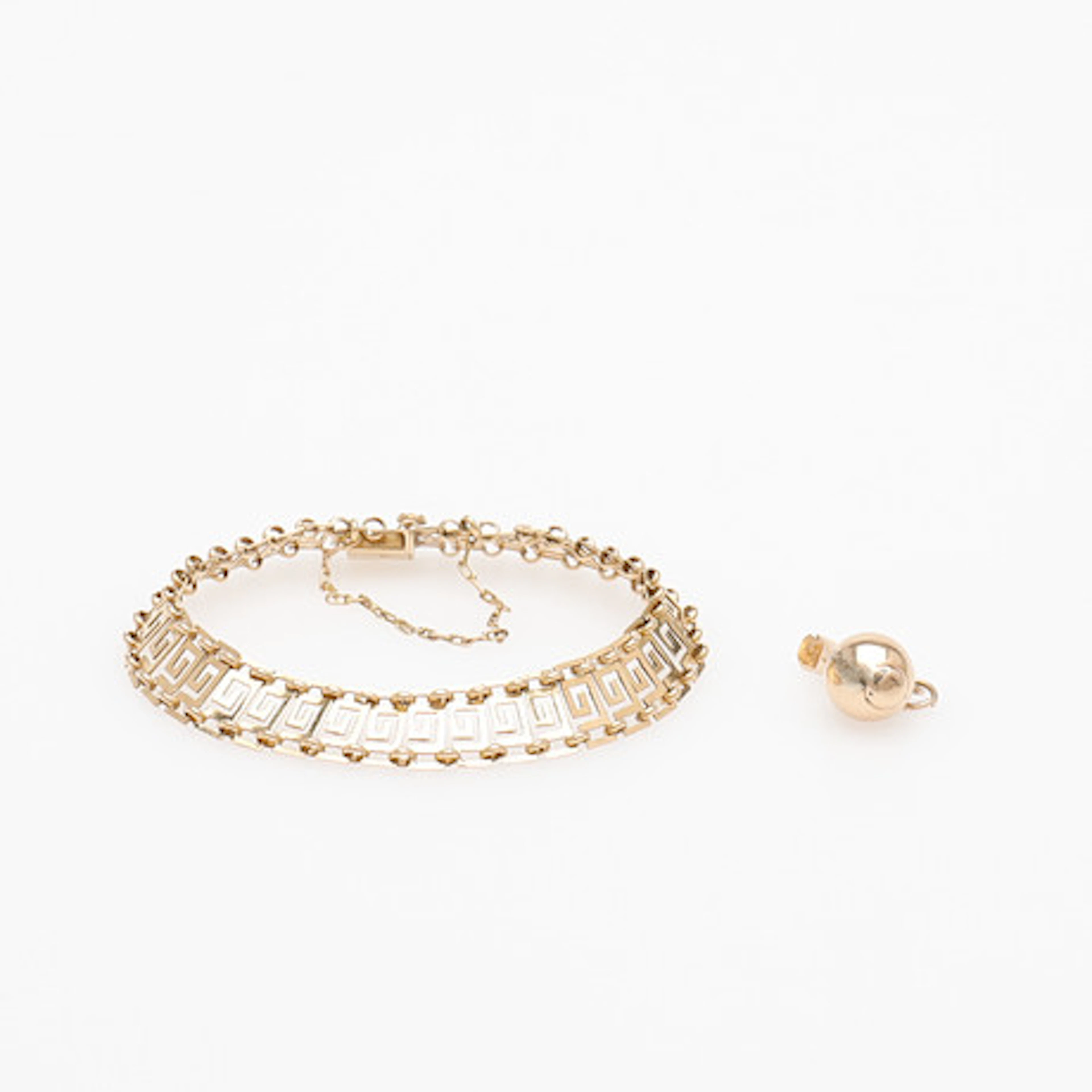 ARMBAND OCH BERLOCK.