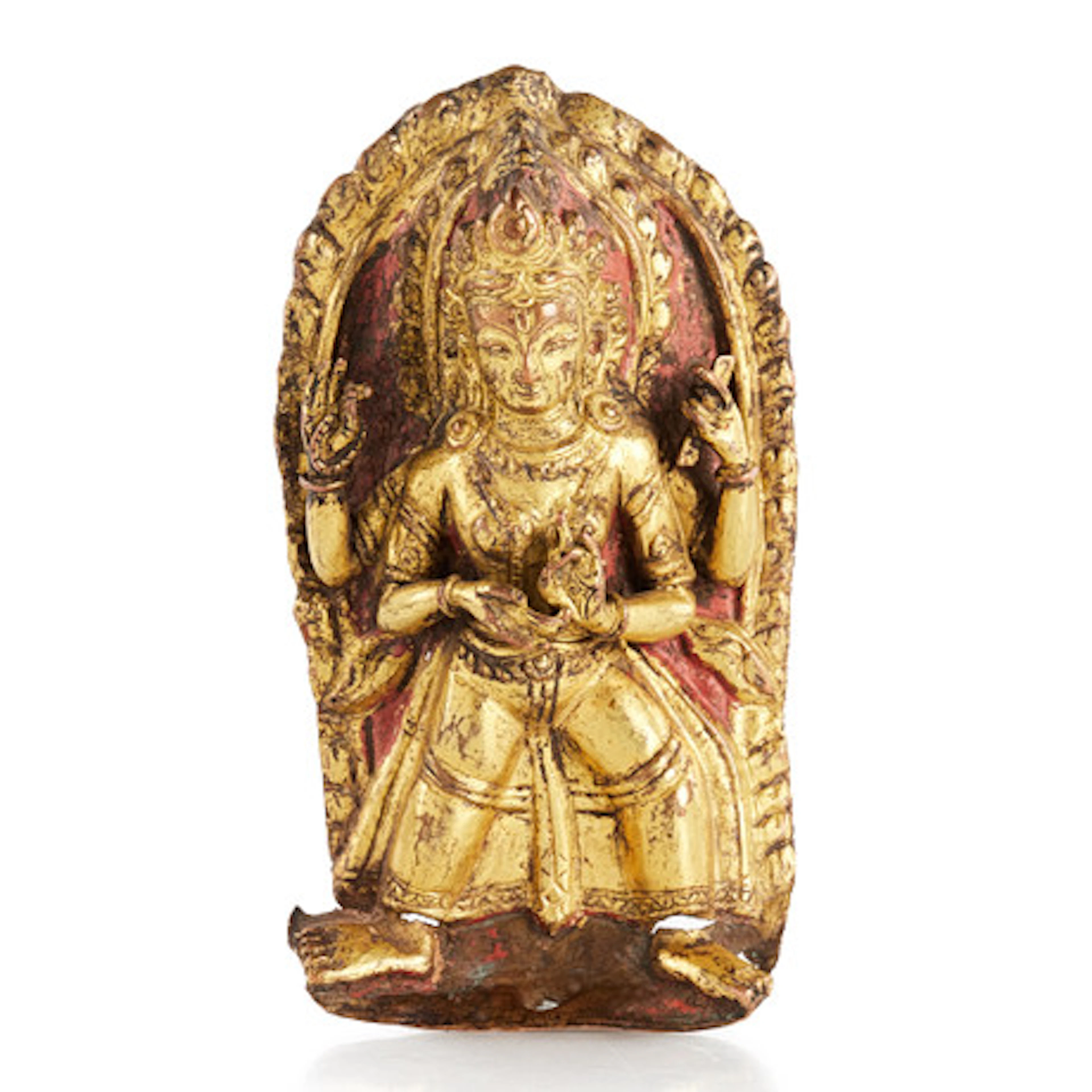 A NEPALESE GILT COPPER REPOUSSÉ PLAQUE REP…