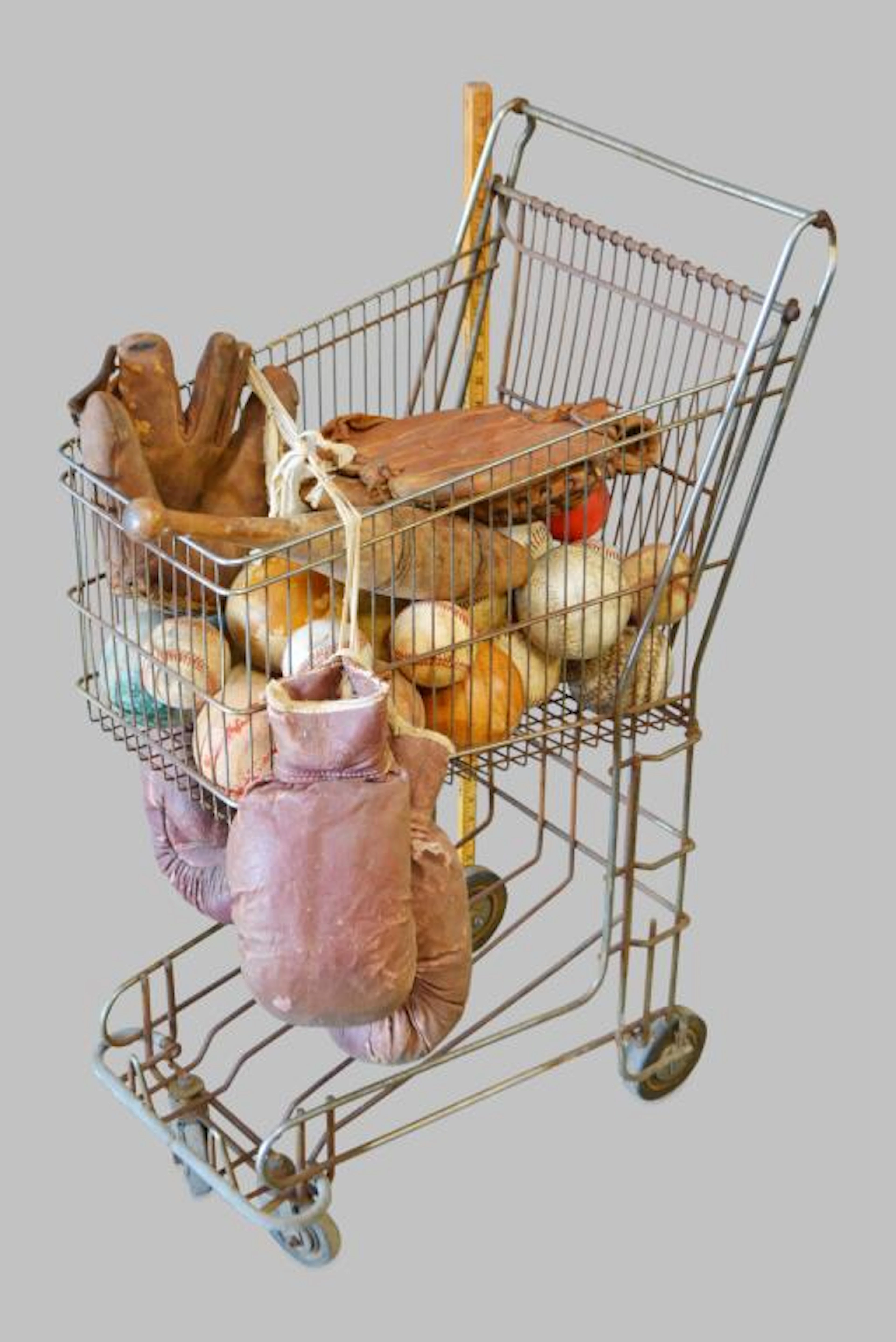 Child's Shopping Cart full of Sports Items *Baseball gloves & baseballs
