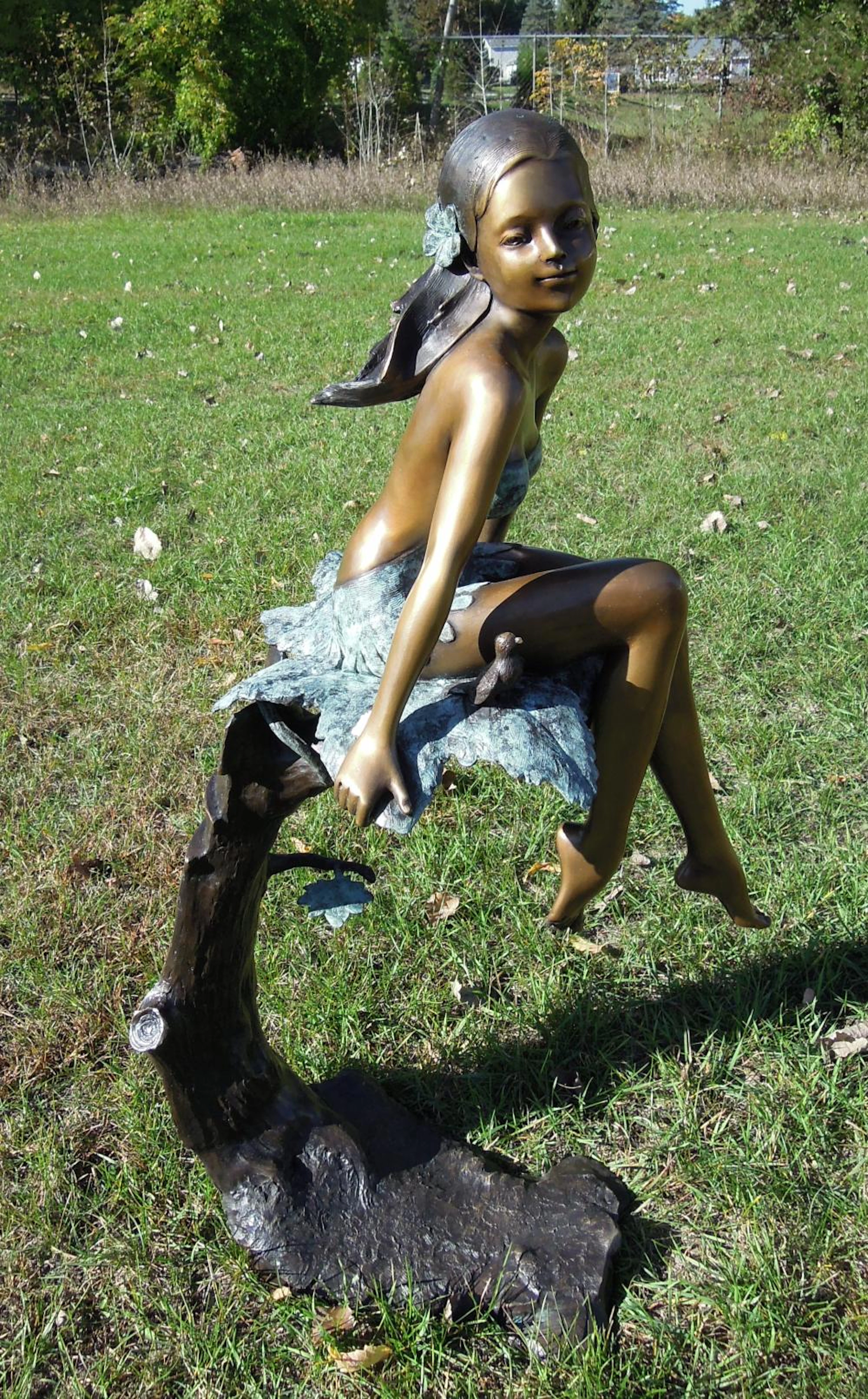 ADORABLE ORIGINAL BRONZE SCULPTURE OF YOUNG GIRL SEATED ON MAPLE LEAF