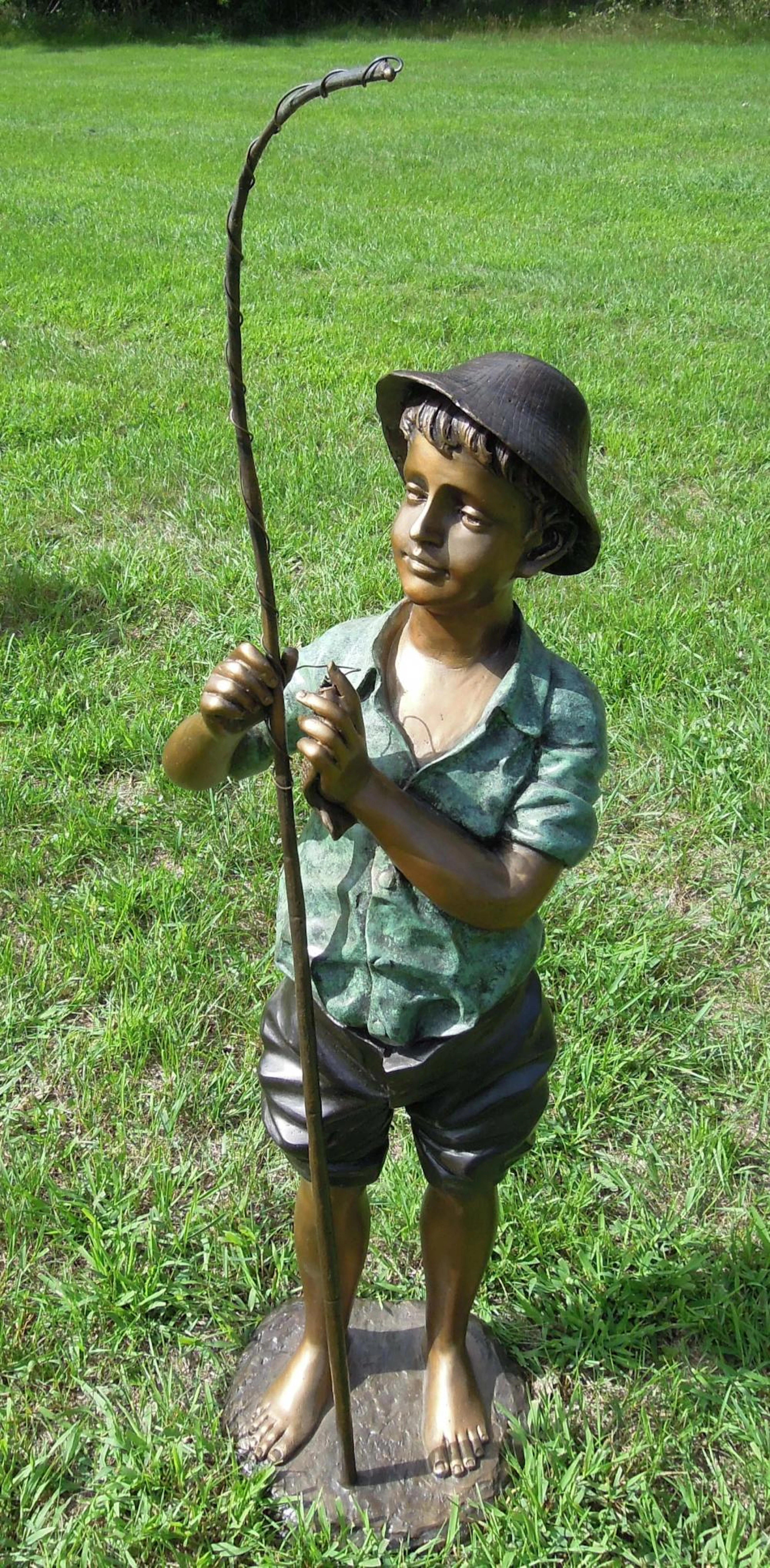 LARGE BRONZE SCULPTURE OF YOUNG BOY WITH FISHING POLE